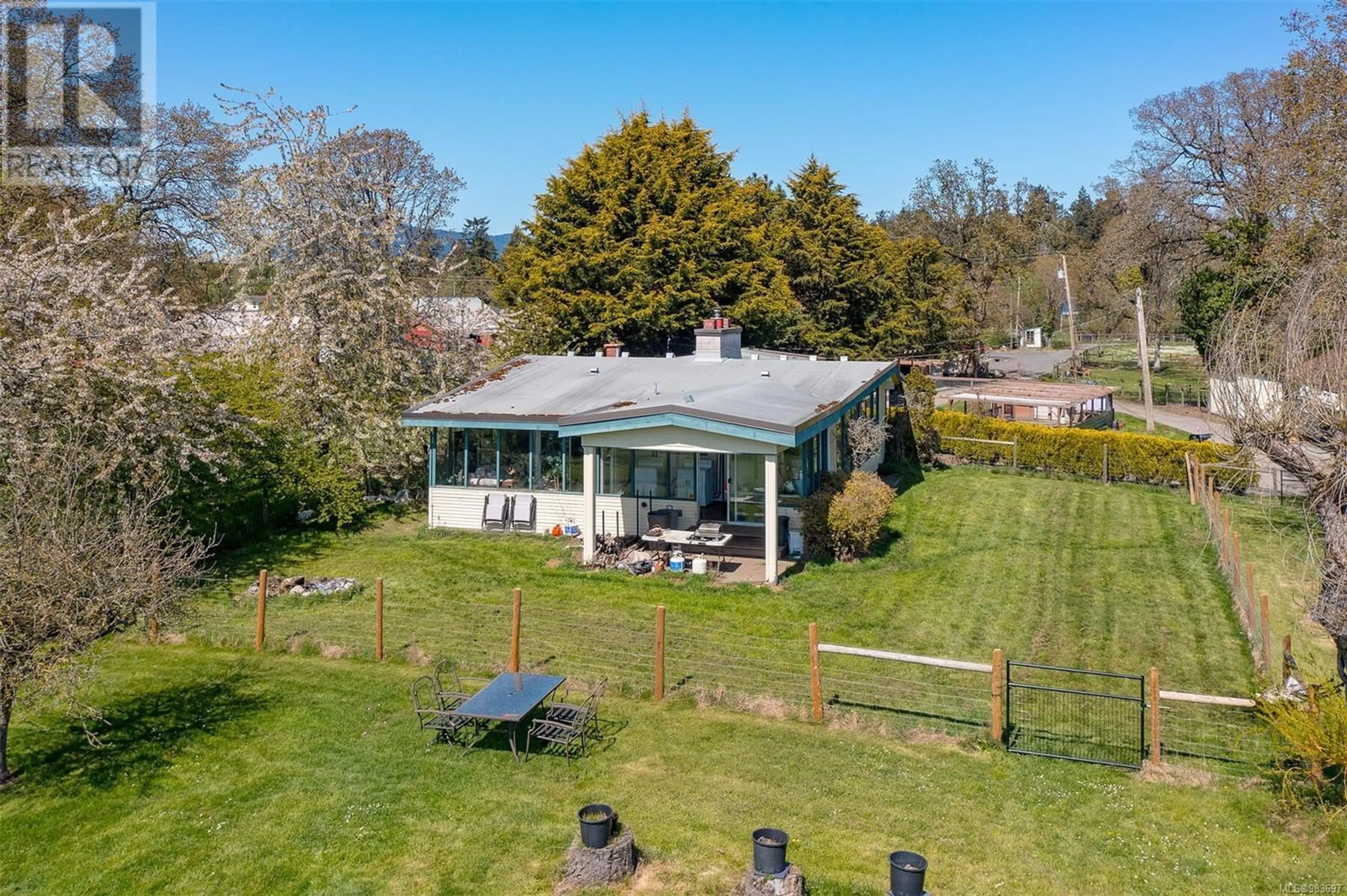 A pic from outside/outdoor area/front of a property/back of a property/a pic from drone, water/lake/river/ocean view for 1899 JOHN ROAD, North Saanich British Columbia V8L5S8