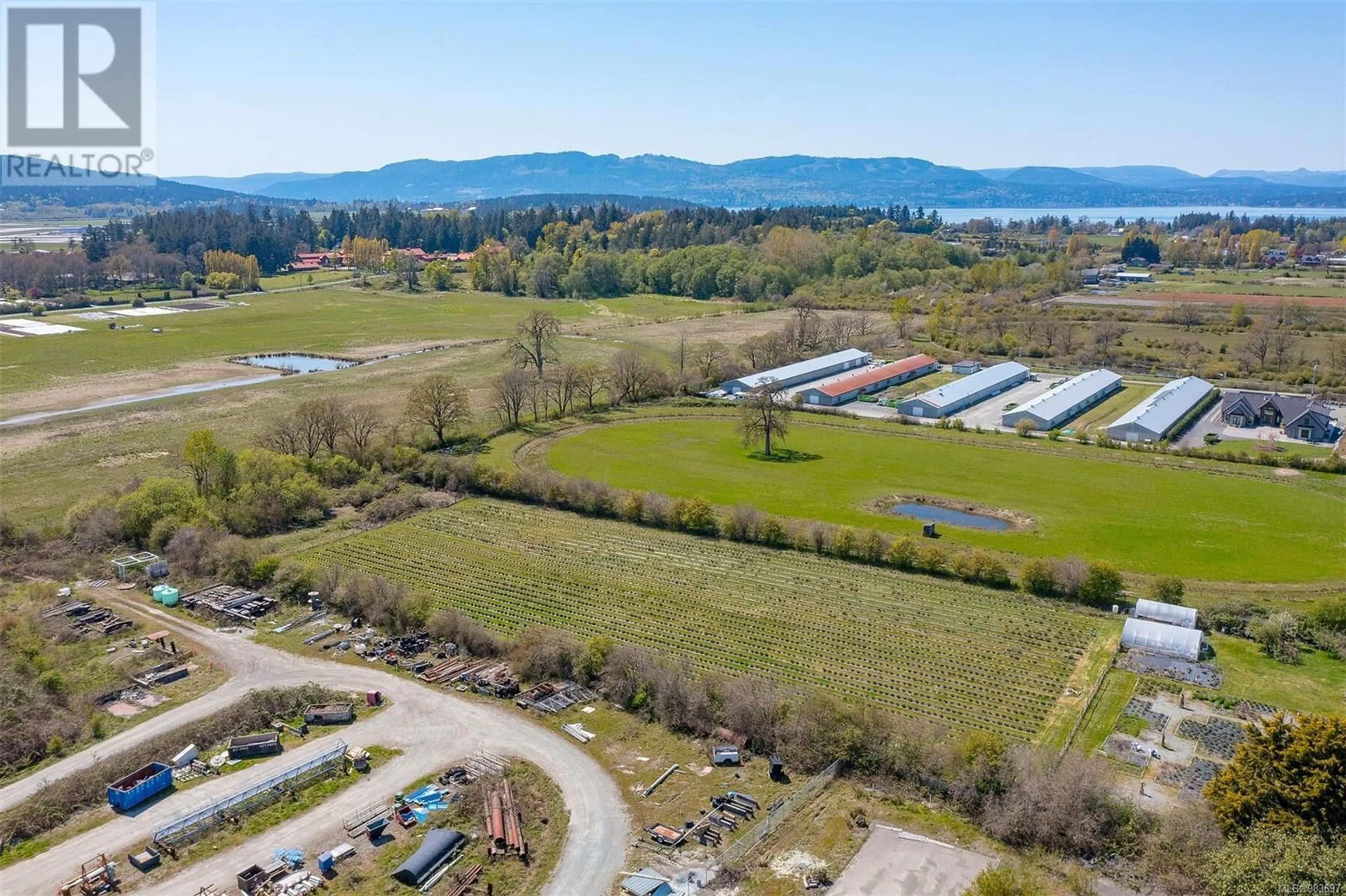 A pic from outside/outdoor area/front of a property/back of a property/a pic from drone, water/lake/river/ocean view for 1899 JOHN ROAD, North Saanich British Columbia V8L5S8
