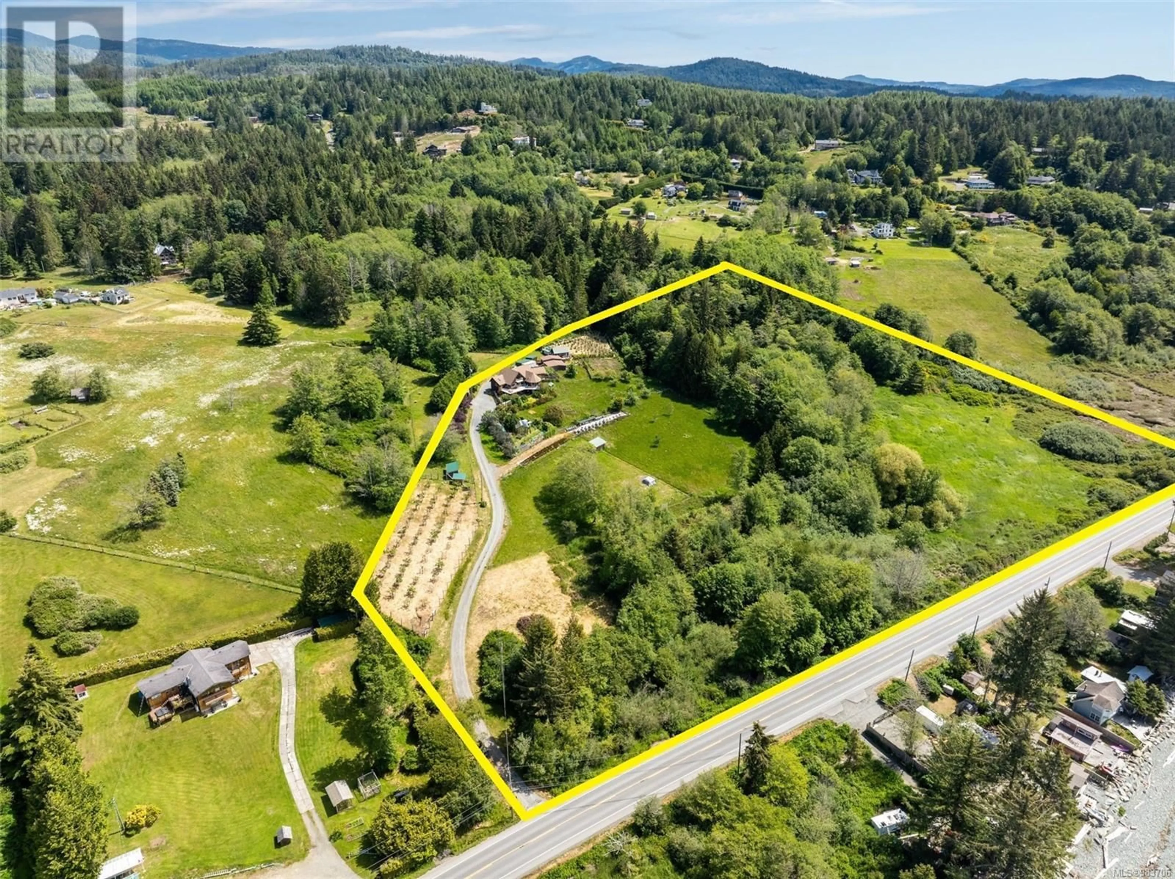 A pic from outside/outdoor area/front of a property/back of a property/a pic from drone, mountain view for 8750 West Coast Rd, Sooke British Columbia V9Z1H2