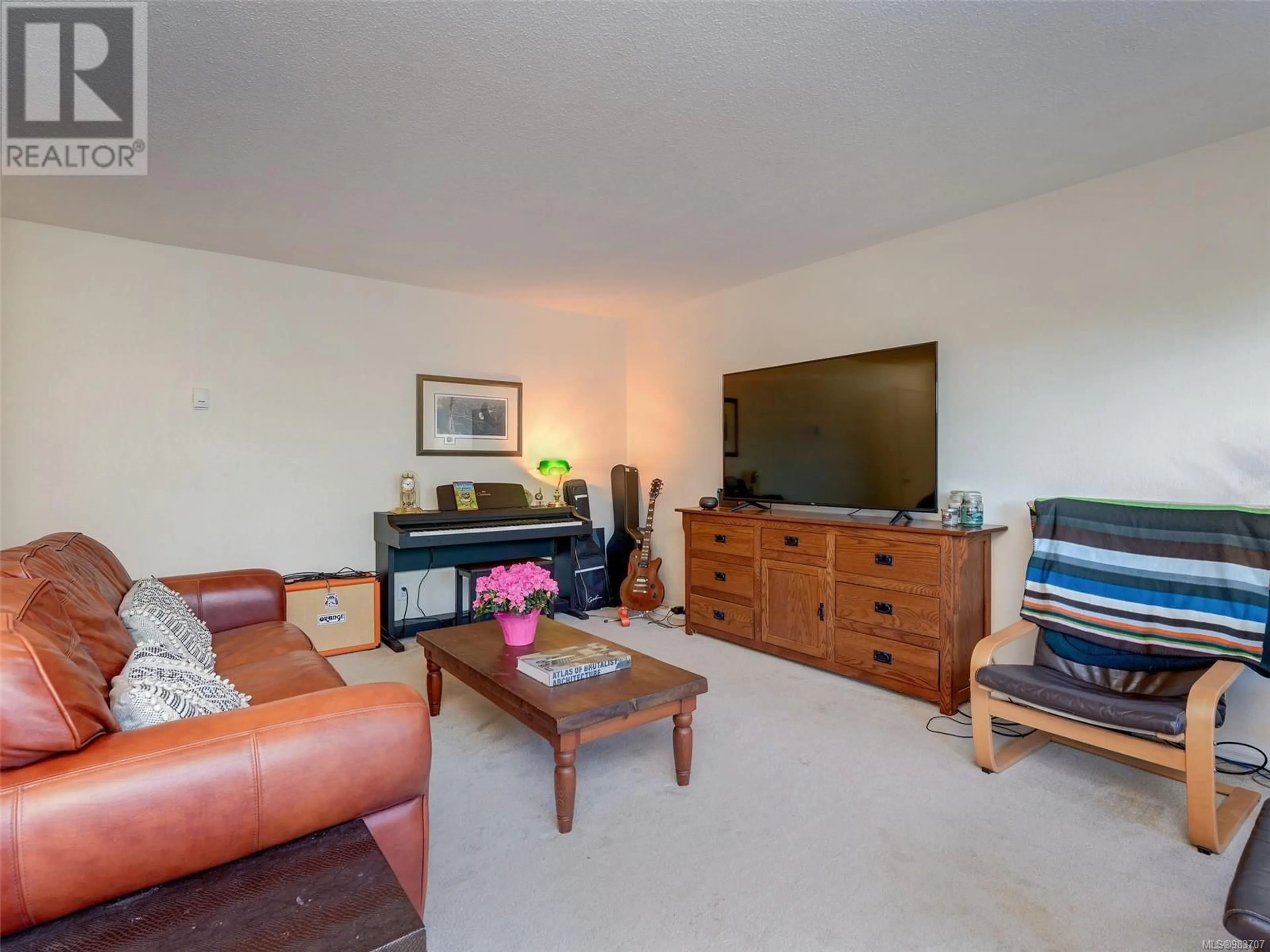 Living room with furniture, unknown for 201 830 Esquimalt Rd, Esquimalt British Columbia V9A3M4