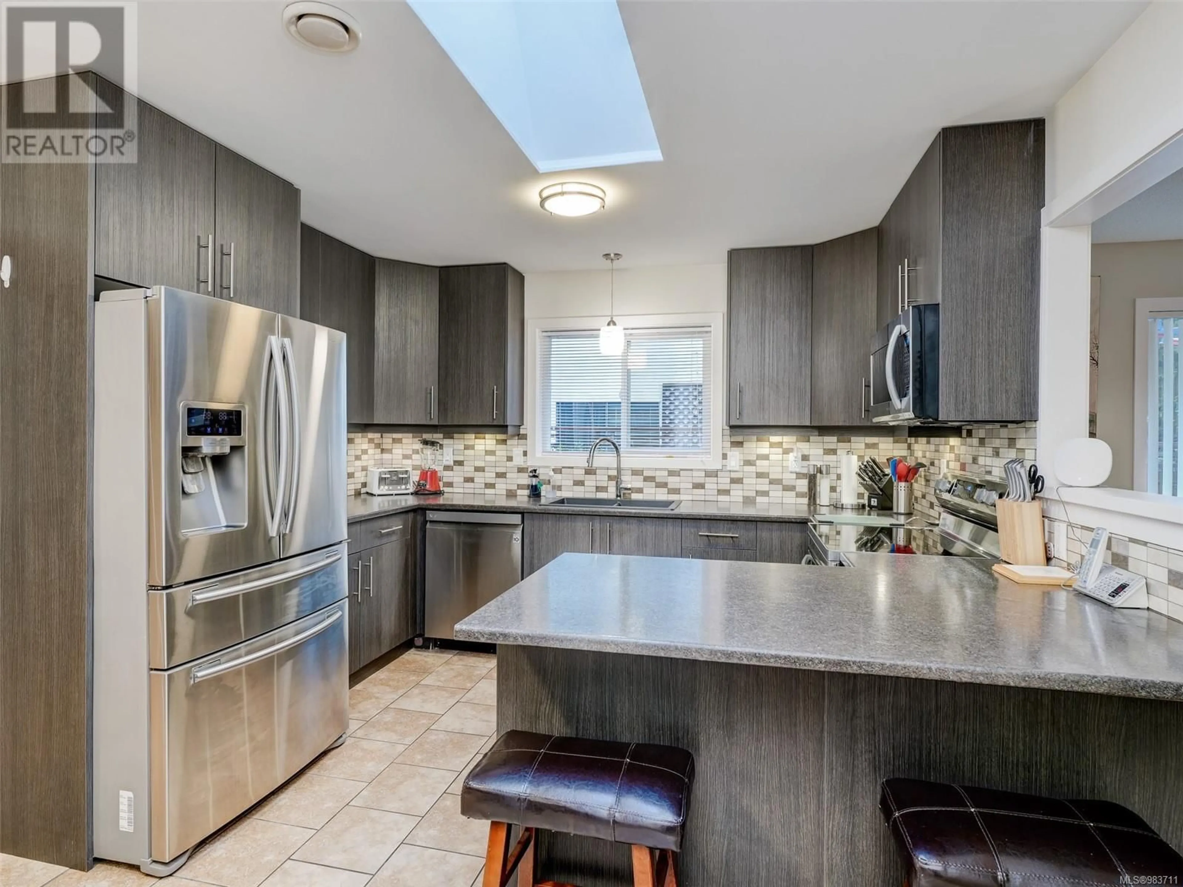 Contemporary kitchen, ceramic/tile floor for 1289 Oakmount Rd, Saanich British Columbia V8P1M4