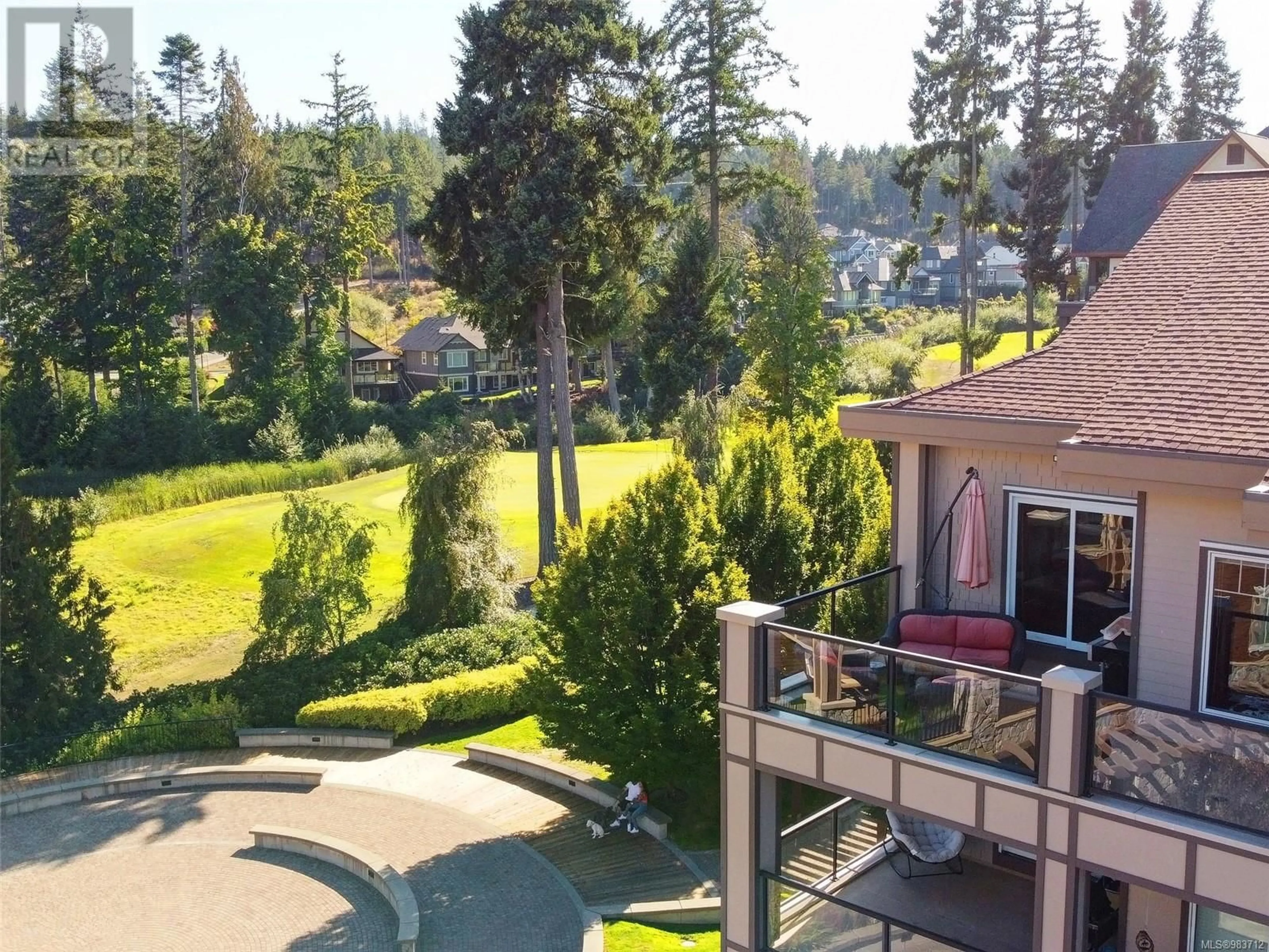 A pic from outside/outdoor area/front of a property/back of a property/a pic from drone, mountain view for 401 1335 Bear Mountain Pkwy, Langford British Columbia V9B6T9