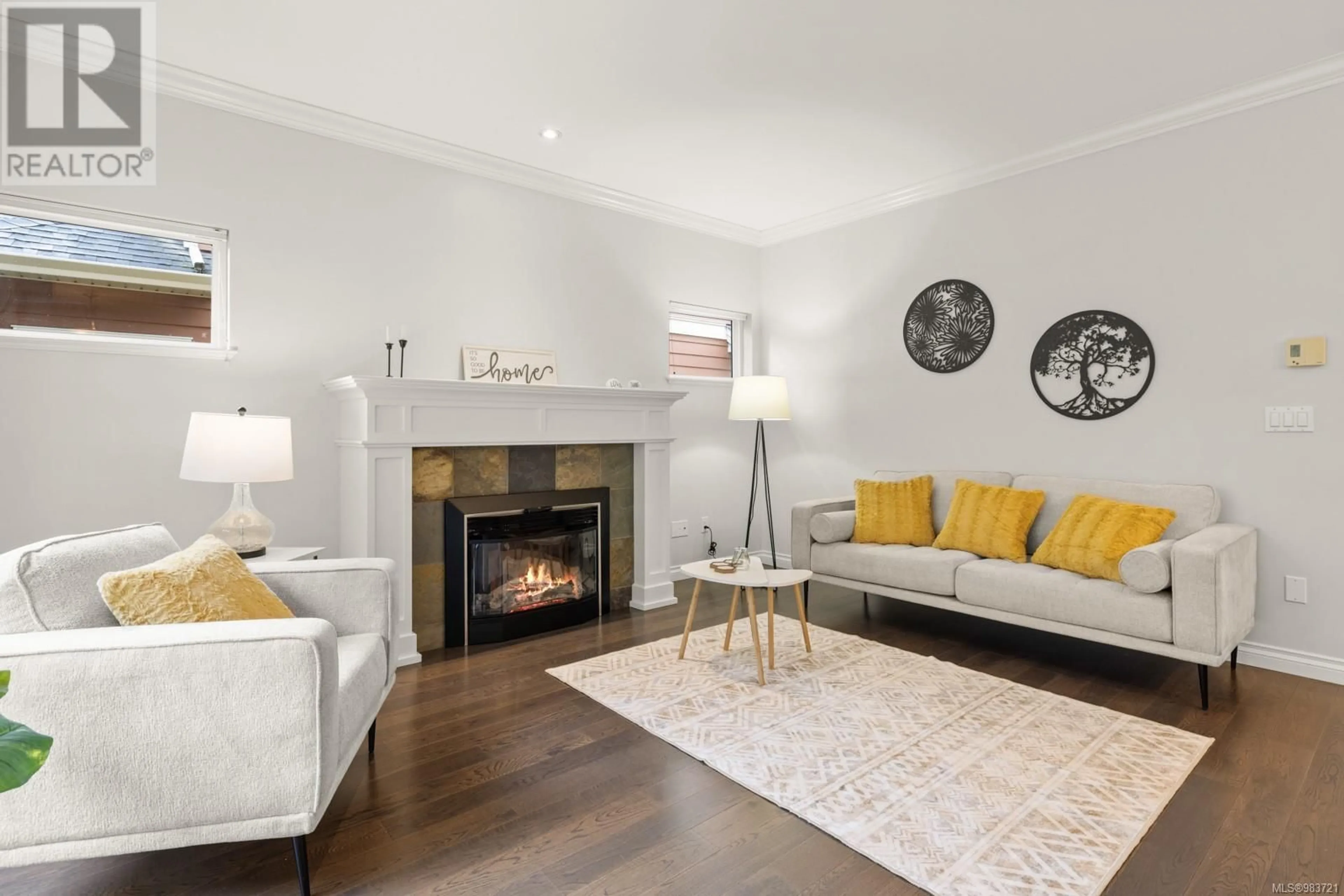 Living room with furniture, wood/laminate floor for 3325 Blueberry Lane, Langford British Columbia V9C0A9