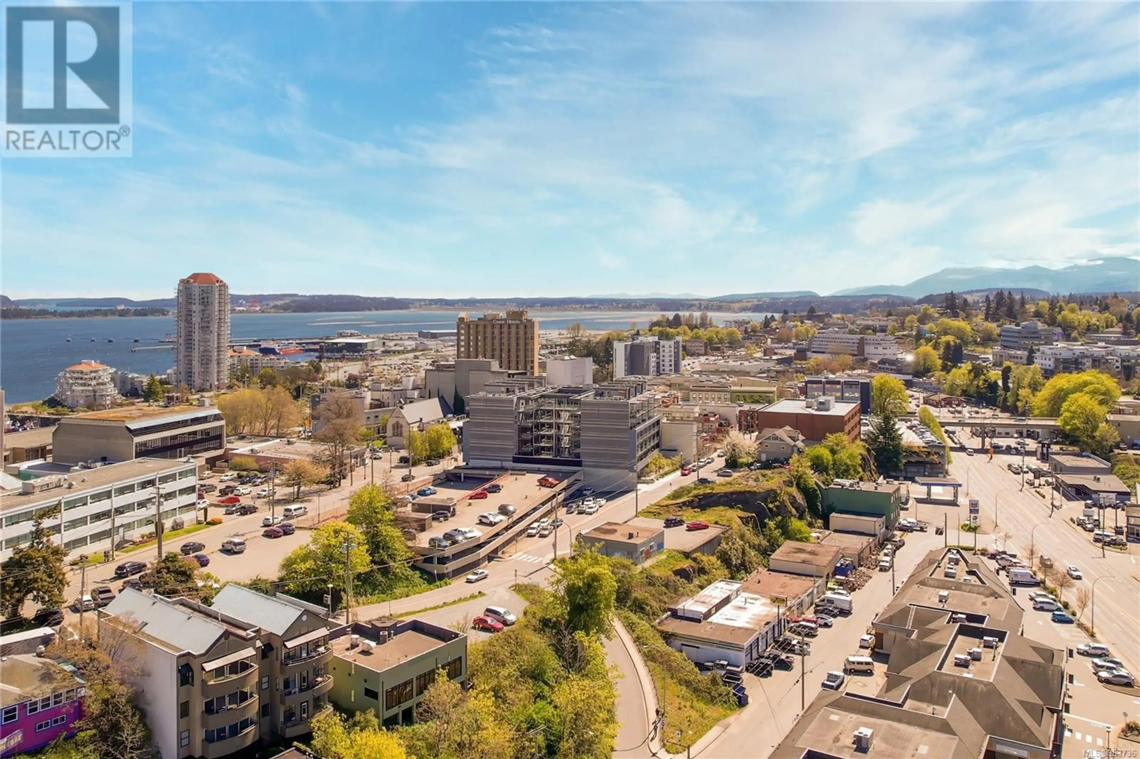 A pic from outside/outdoor area/front of a property/back of a property/a pic from drone, mountain view for 402 91 Chapel St, Nanaimo British Columbia V9R5H3