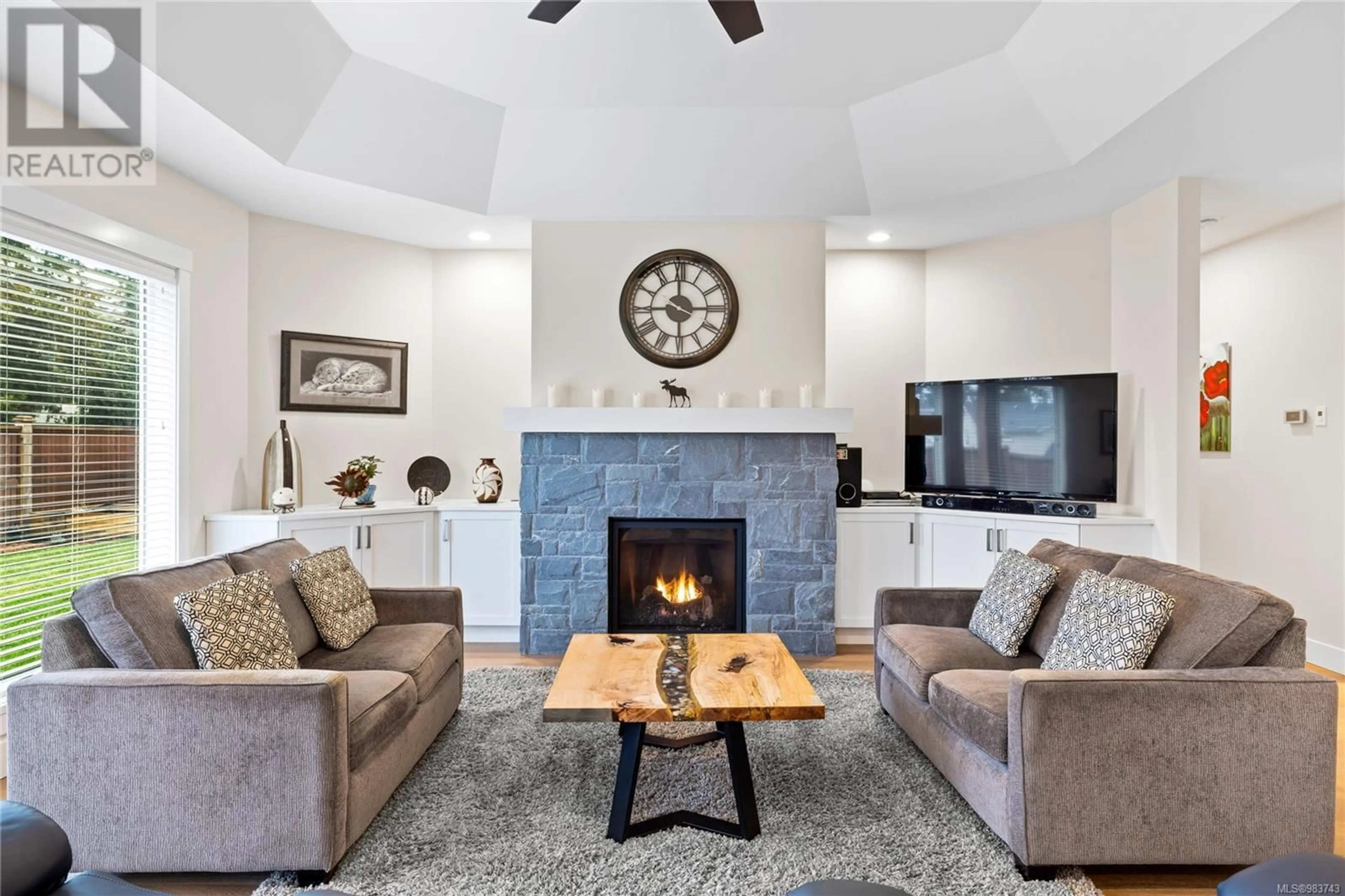 Living room with furniture, ceramic/tile floor for 1004 Brookfield Cres, French Creek British Columbia V9P0E3