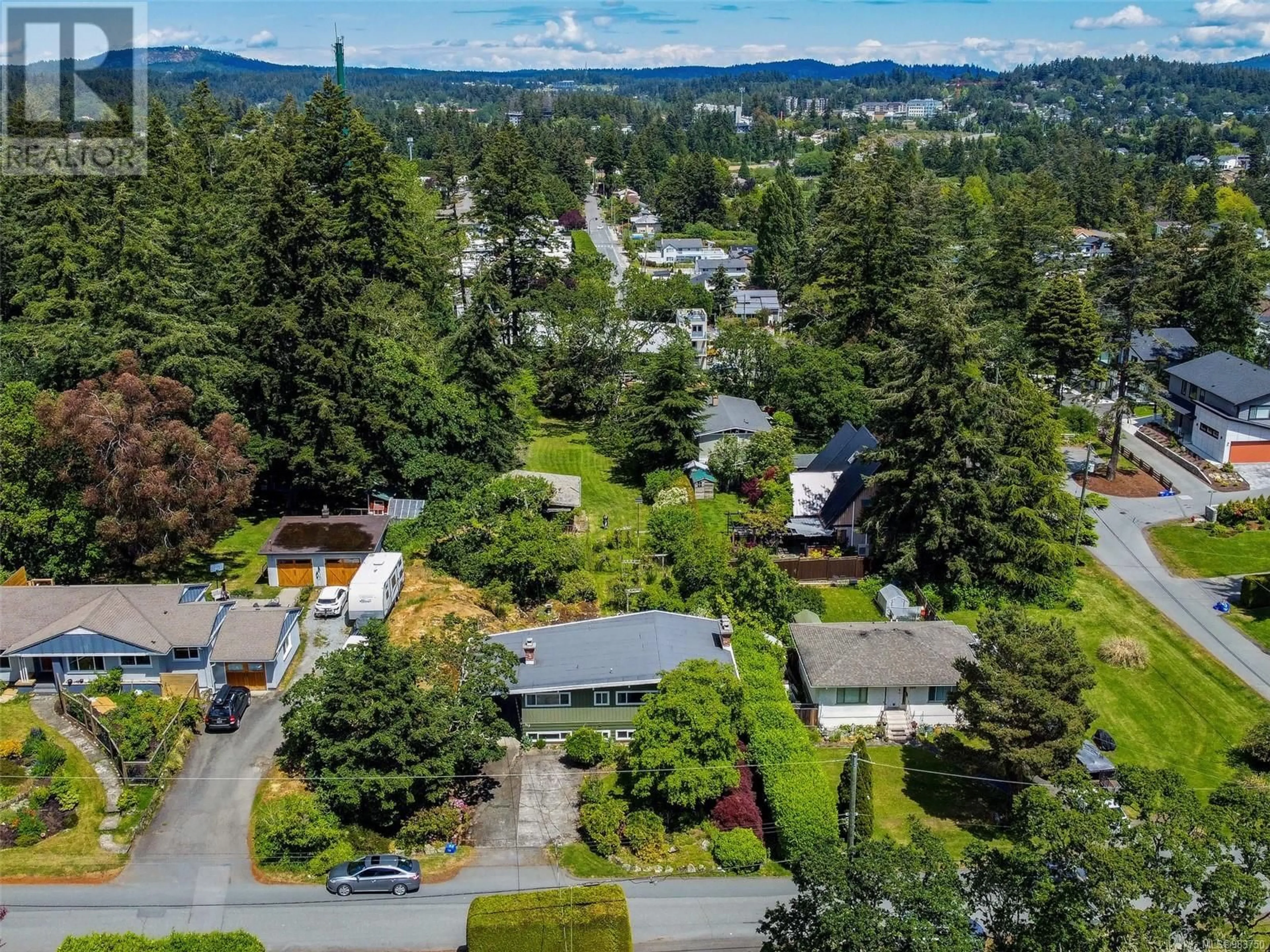 A pic from outside/outdoor area/front of a property/back of a property/a pic from drone, mountain view for 512 Prince Robert Dr, View Royal British Columbia V9B1C8