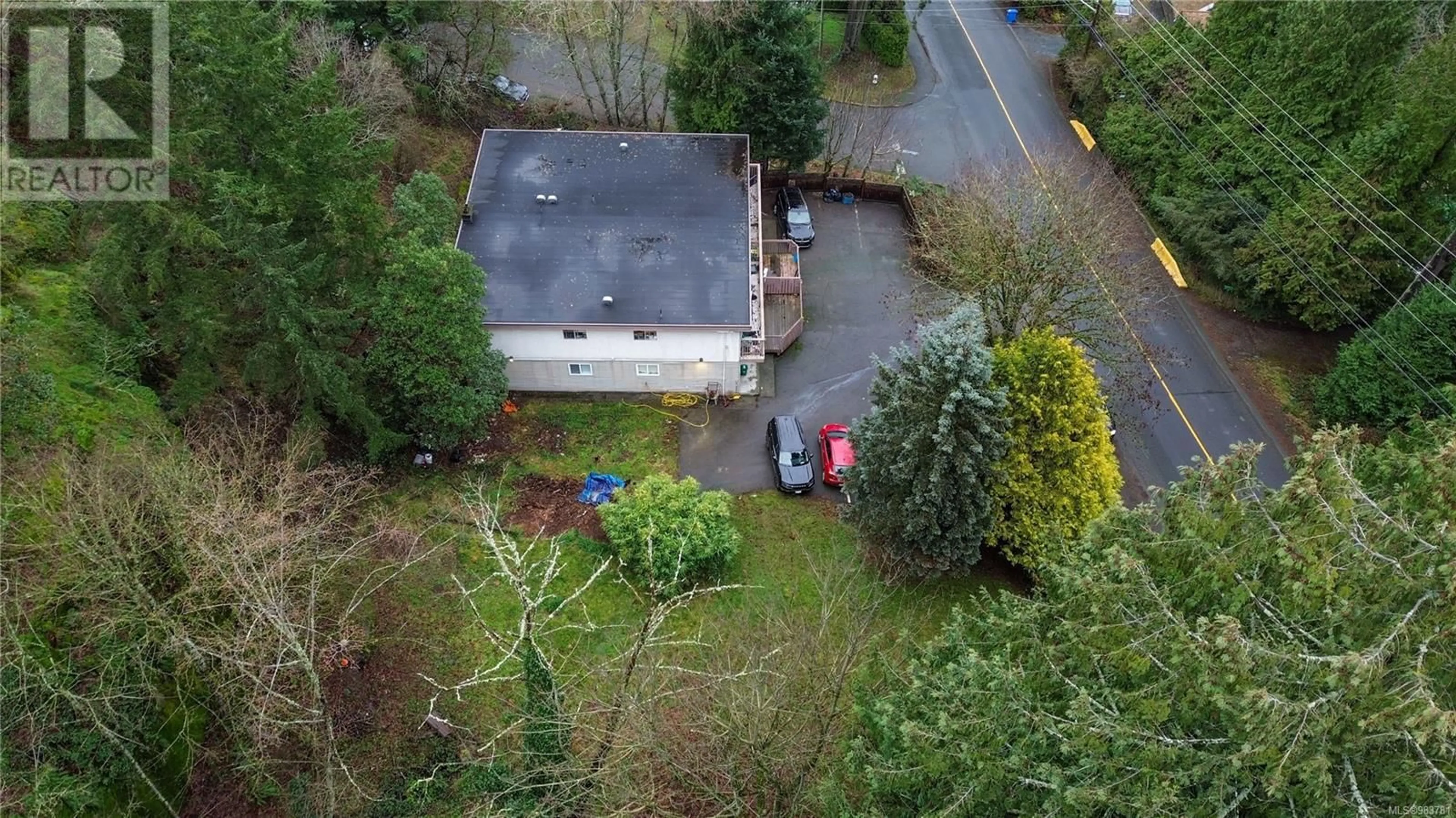 A pic from outside/outdoor area/front of a property/back of a property/a pic from drone, street for 3319 Fulton Rd, Colwood British Columbia V9C2V1