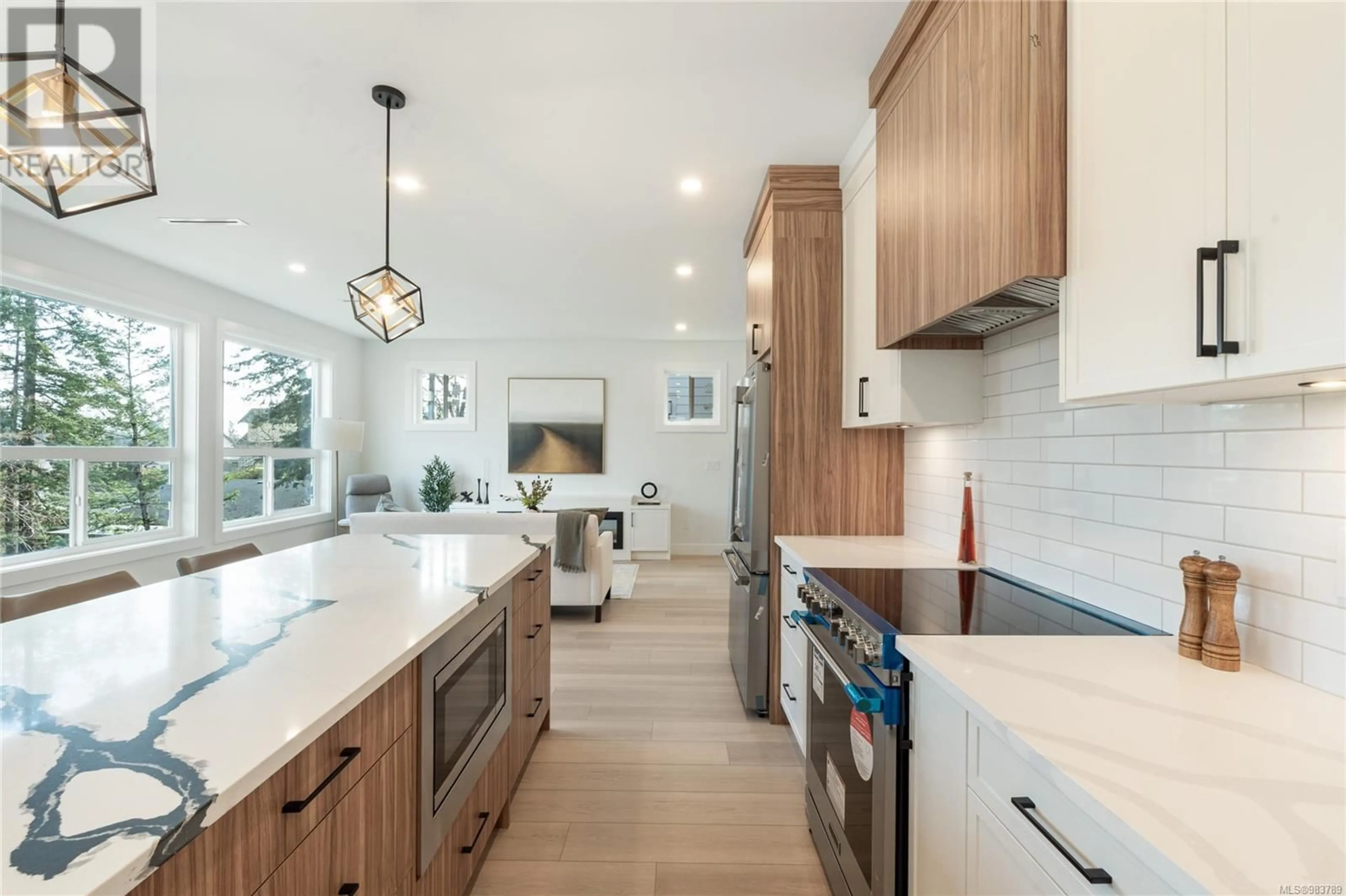 Open concept kitchen, ceramic/tile floor for 2339 Swallow Pl, Langford British Columbia V9B6Y6