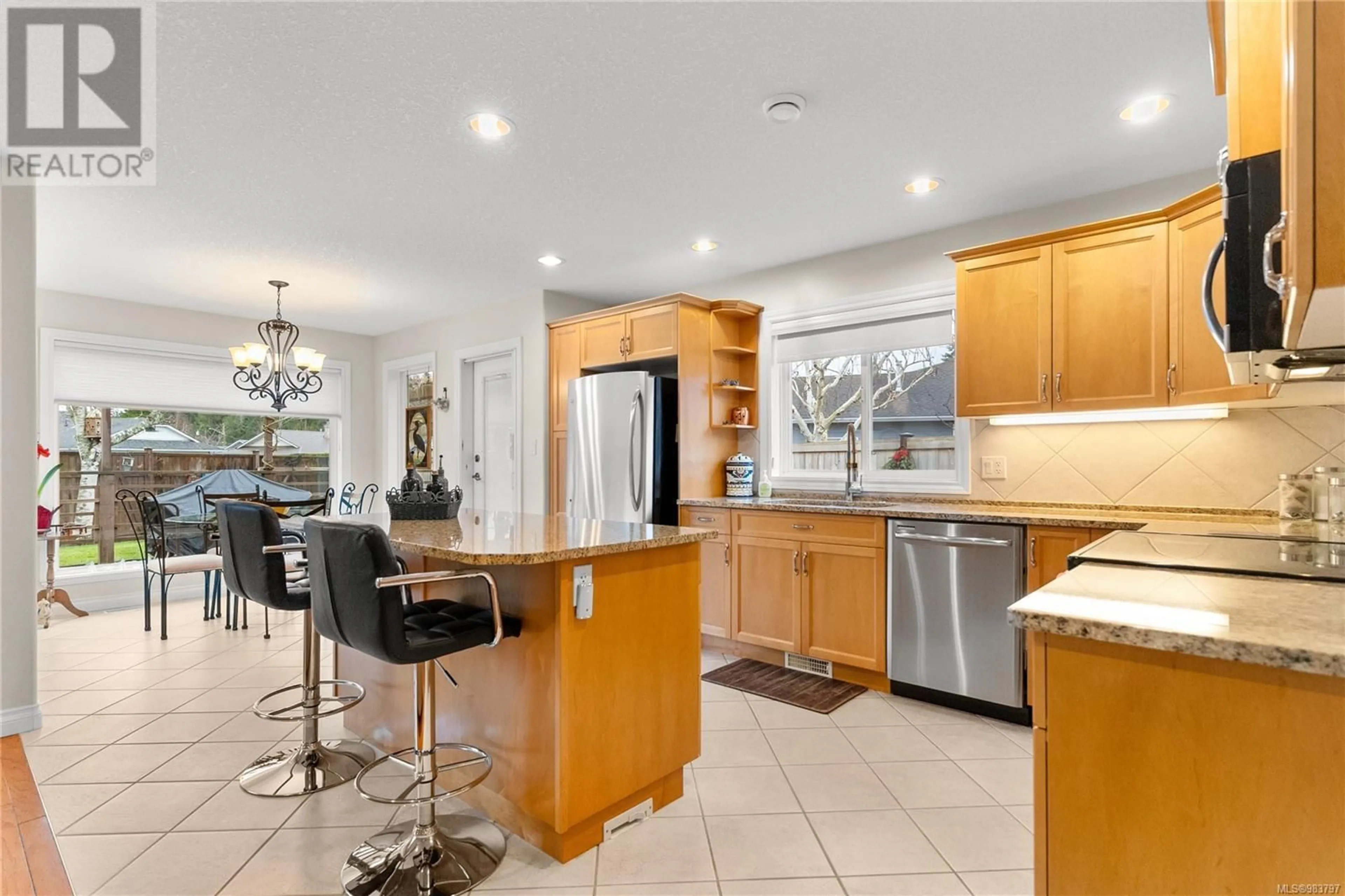 Open concept kitchen, ceramic/tile floor for 821 Bristol Pl, Qualicum Beach British Columbia V9K2S7