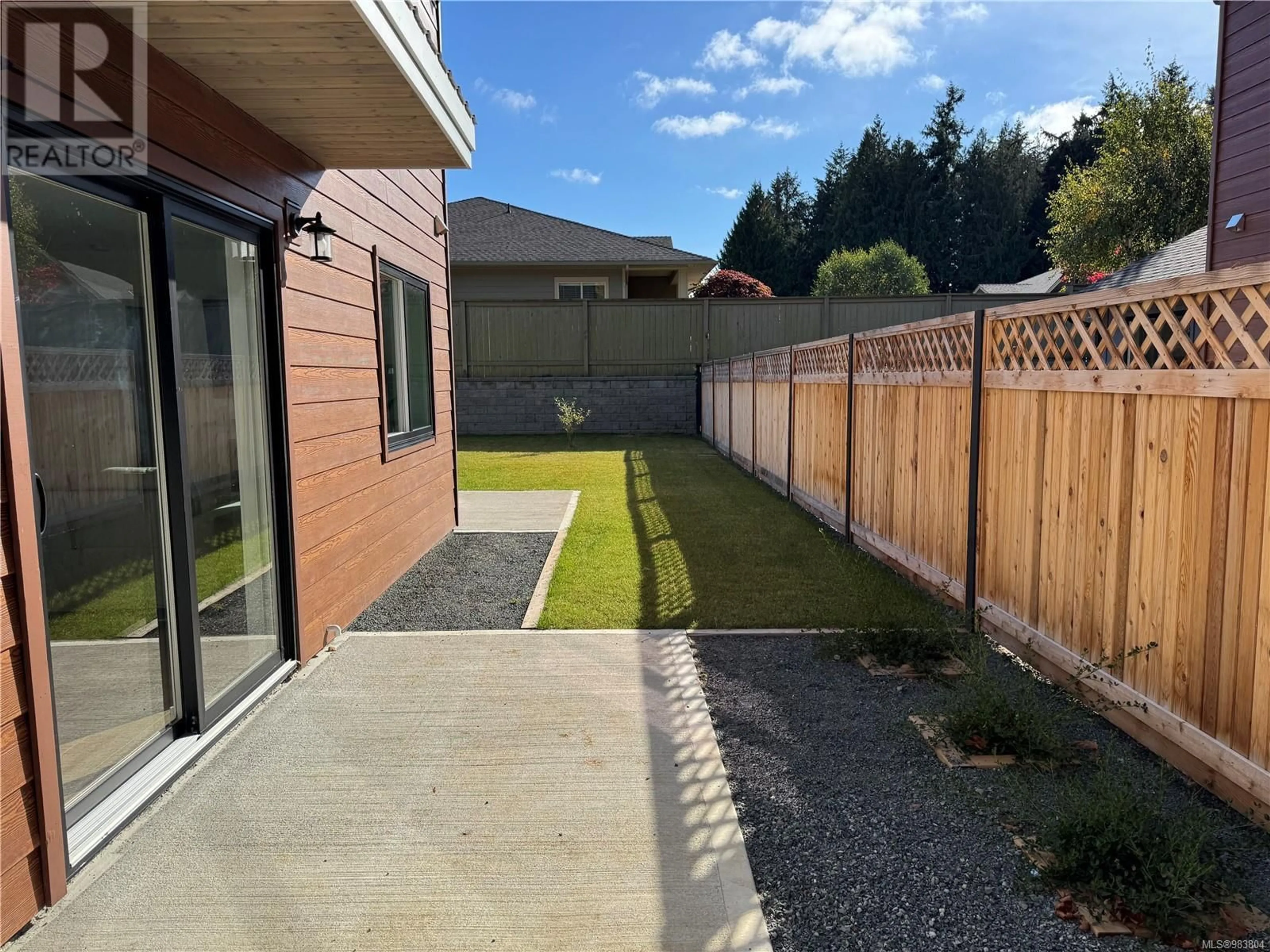 A pic from outside/outdoor area/front of a property/back of a property/a pic from drone, street for 2 570 Tulip Ave, Parksville British Columbia V9P1T7