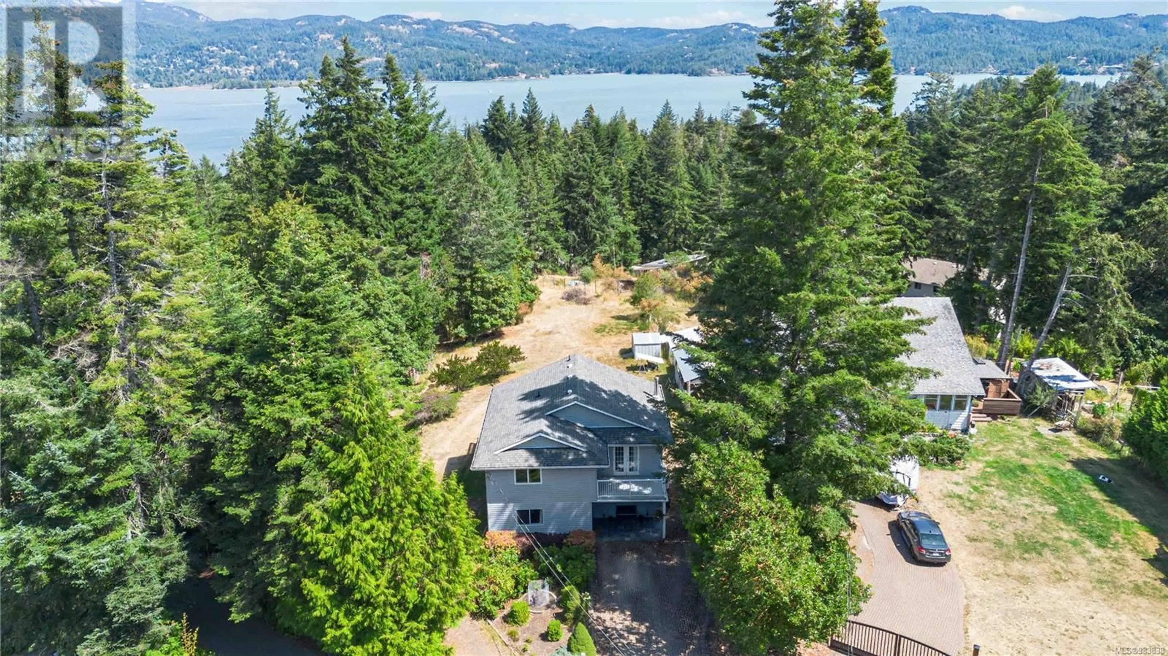 A pic from outside/outdoor area/front of a property/back of a property/a pic from drone, water/lake/river/ocean view for 1385 Clun Pl, Sooke British Columbia V9Z1B1