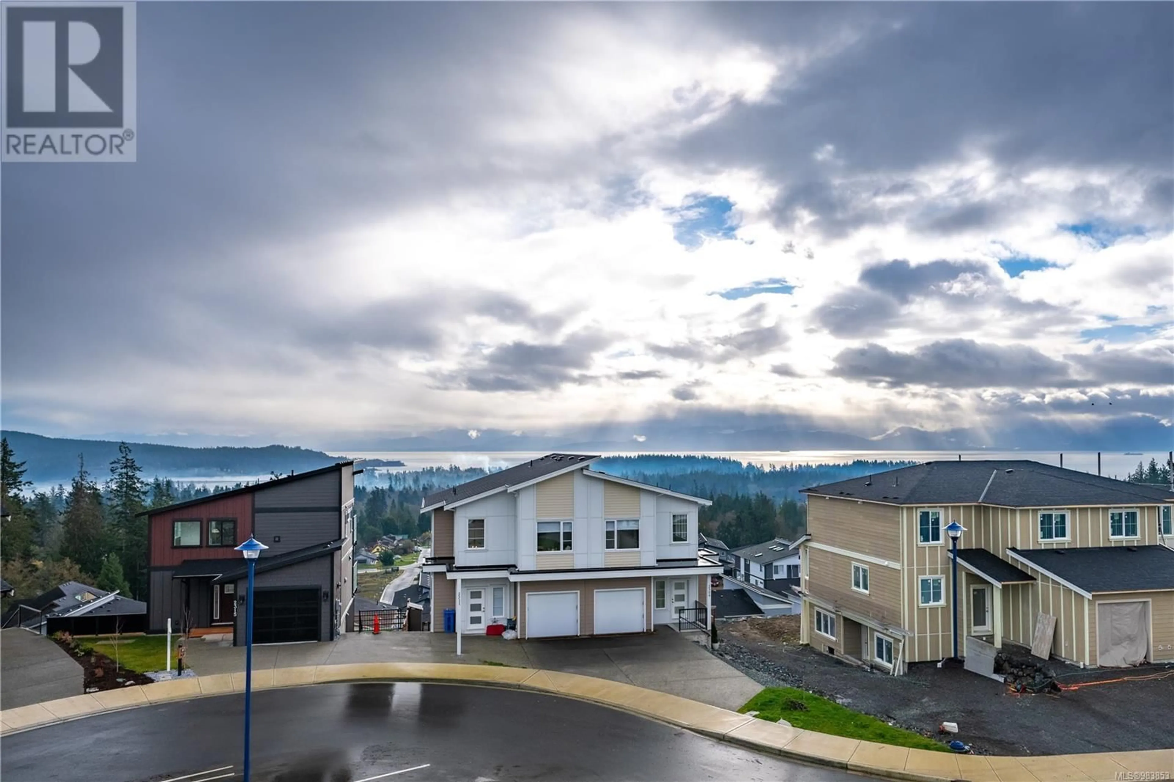 A pic from outside/outdoor area/front of a property/back of a property/a pic from drone, mountain view for 2310 Hudson Terr, Sooke British Columbia V9Z1R2