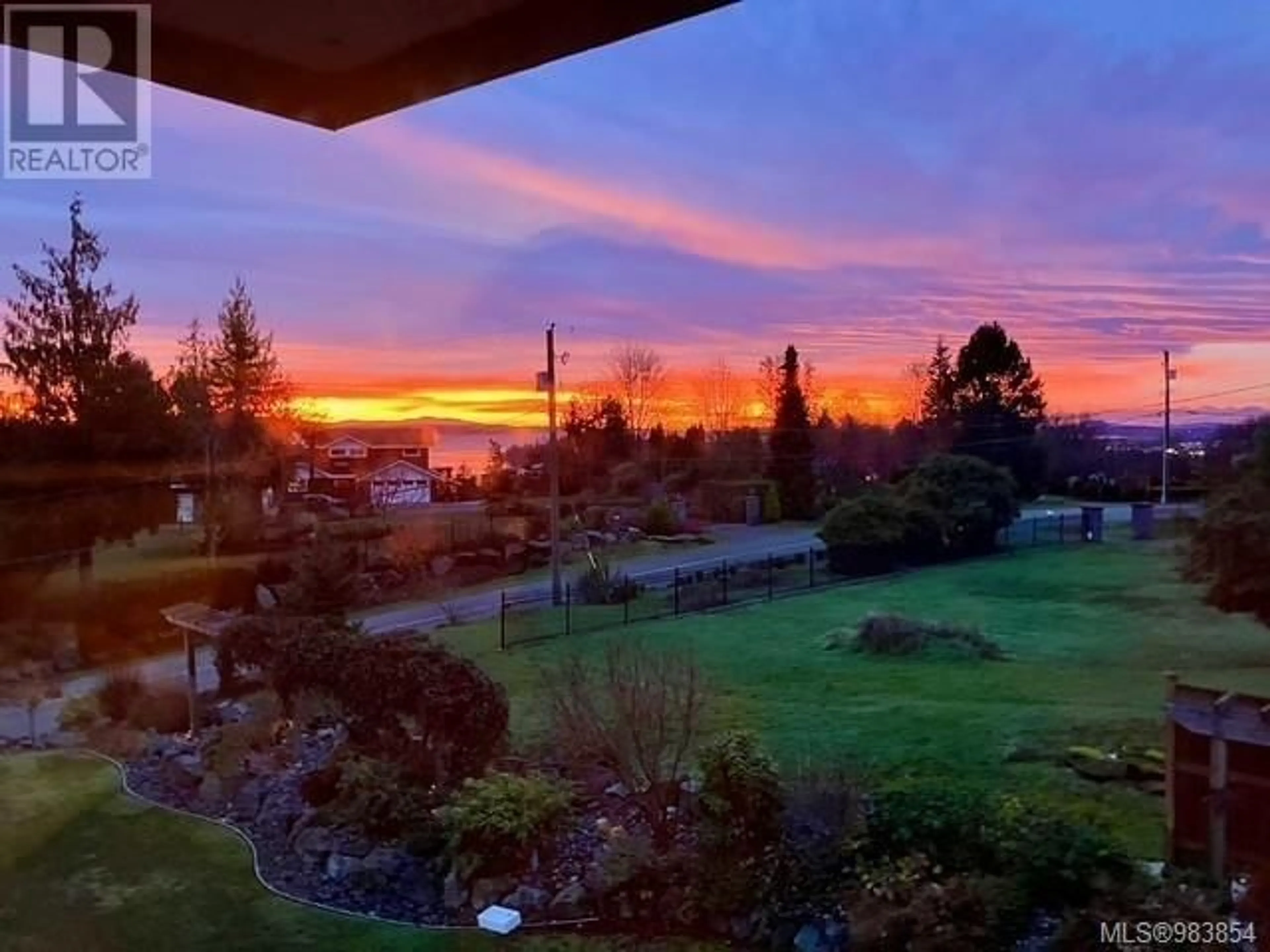 A pic from outside/outdoor area/front of a property/back of a property/a pic from drone, water/lake/river/ocean view for 11096 Greenpark Dr, North Saanich British Columbia V8L5N5