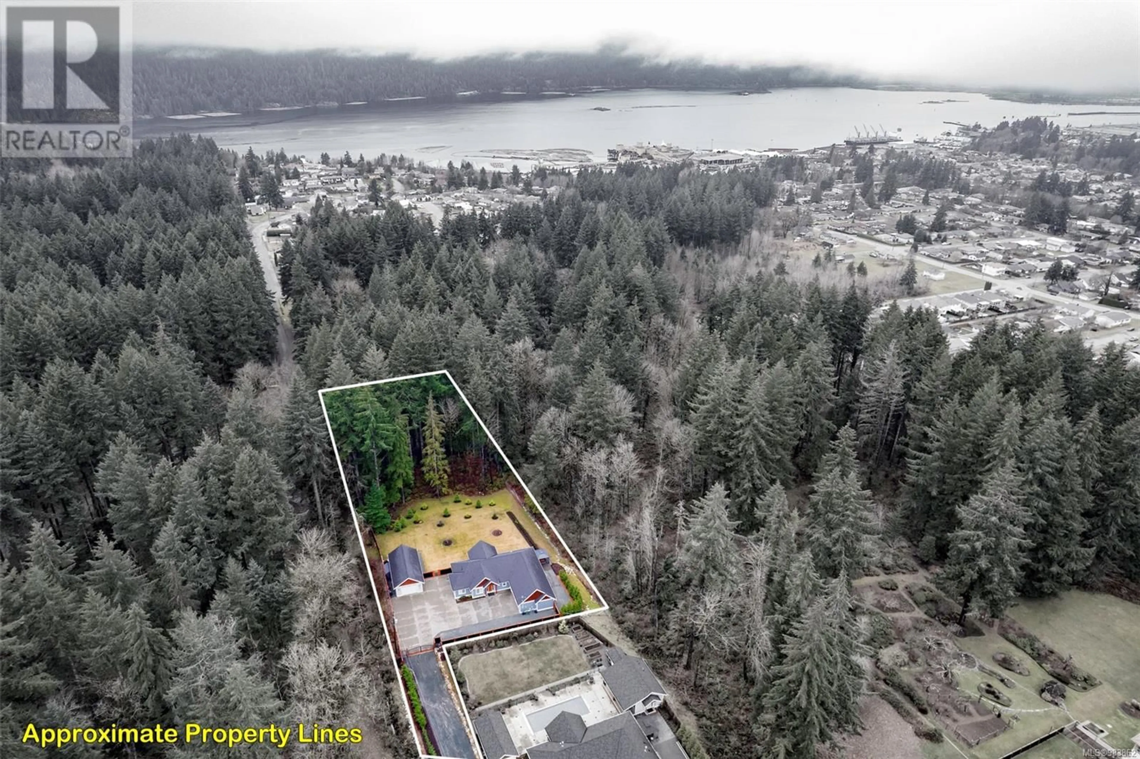 A pic from outside/outdoor area/front of a property/back of a property/a pic from drone, water/lake/river/ocean view for 4289 Ravenhill Ave, Port Alberni British Columbia V9Y0E2