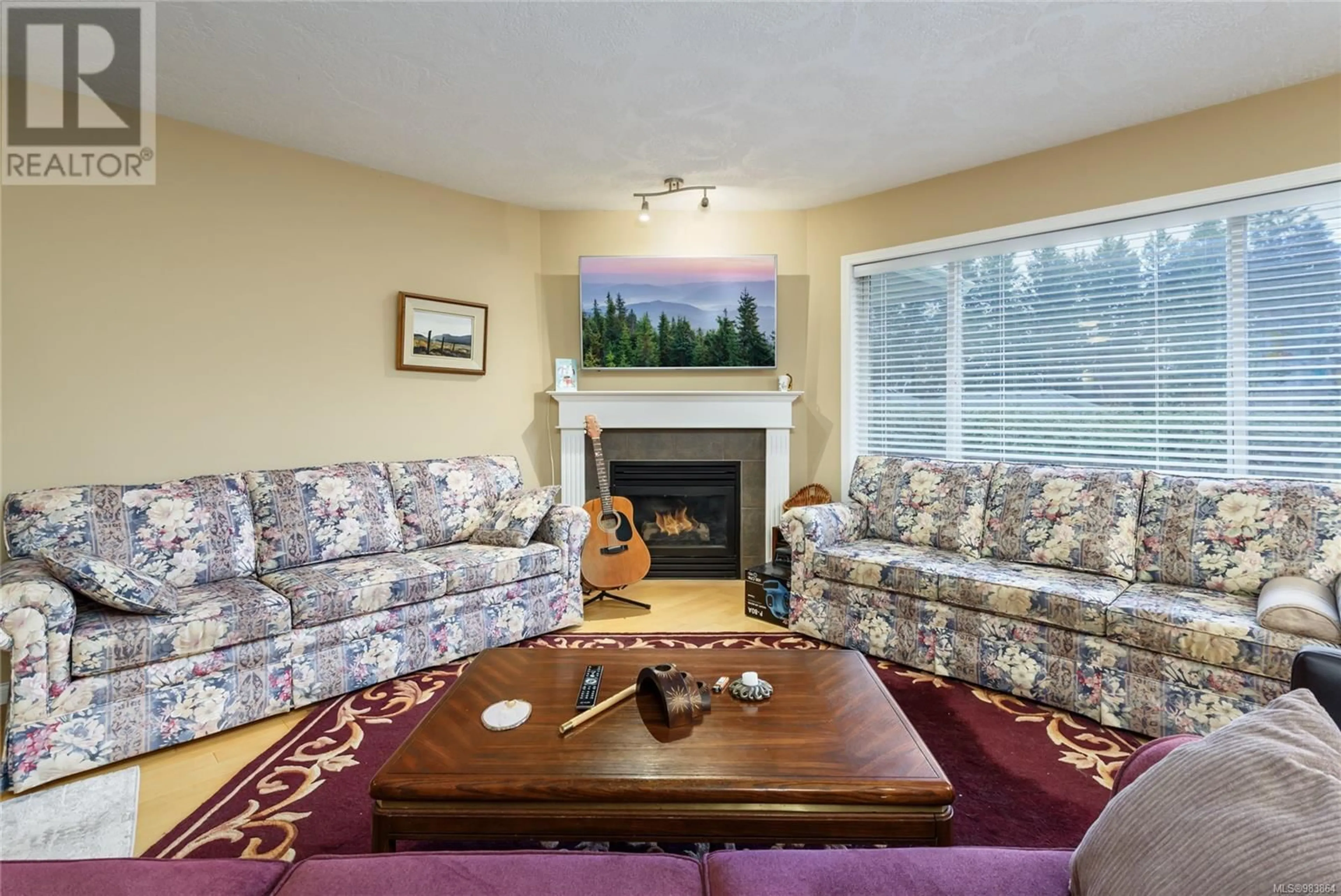 Living room with furniture, carpet floor for 2480 Avro Arrow Dr, Comox British Columbia V9M0A6