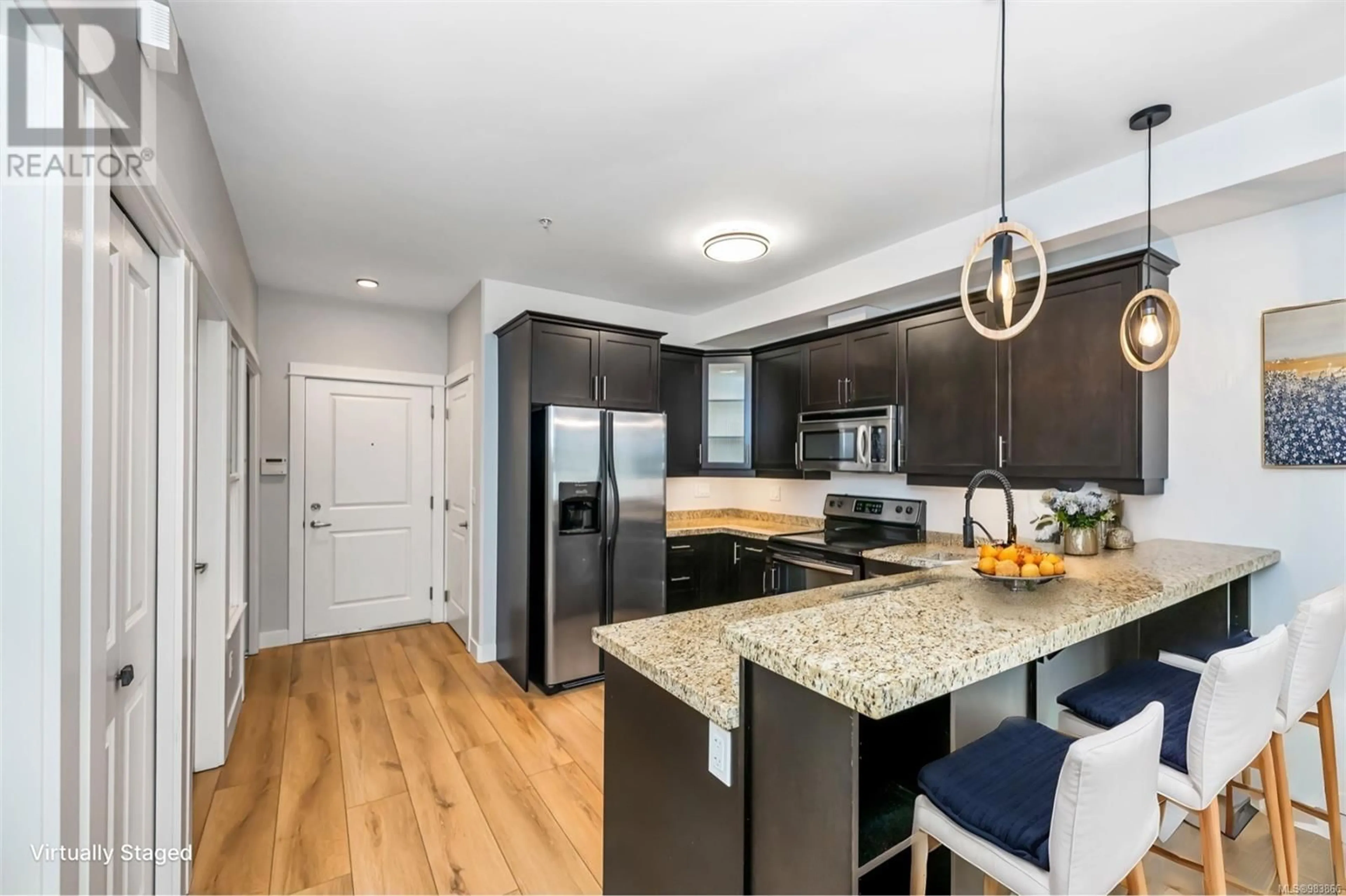 Open concept kitchen, unknown for 103 2710 Jacklin Rd, Langford British Columbia V9B0K5