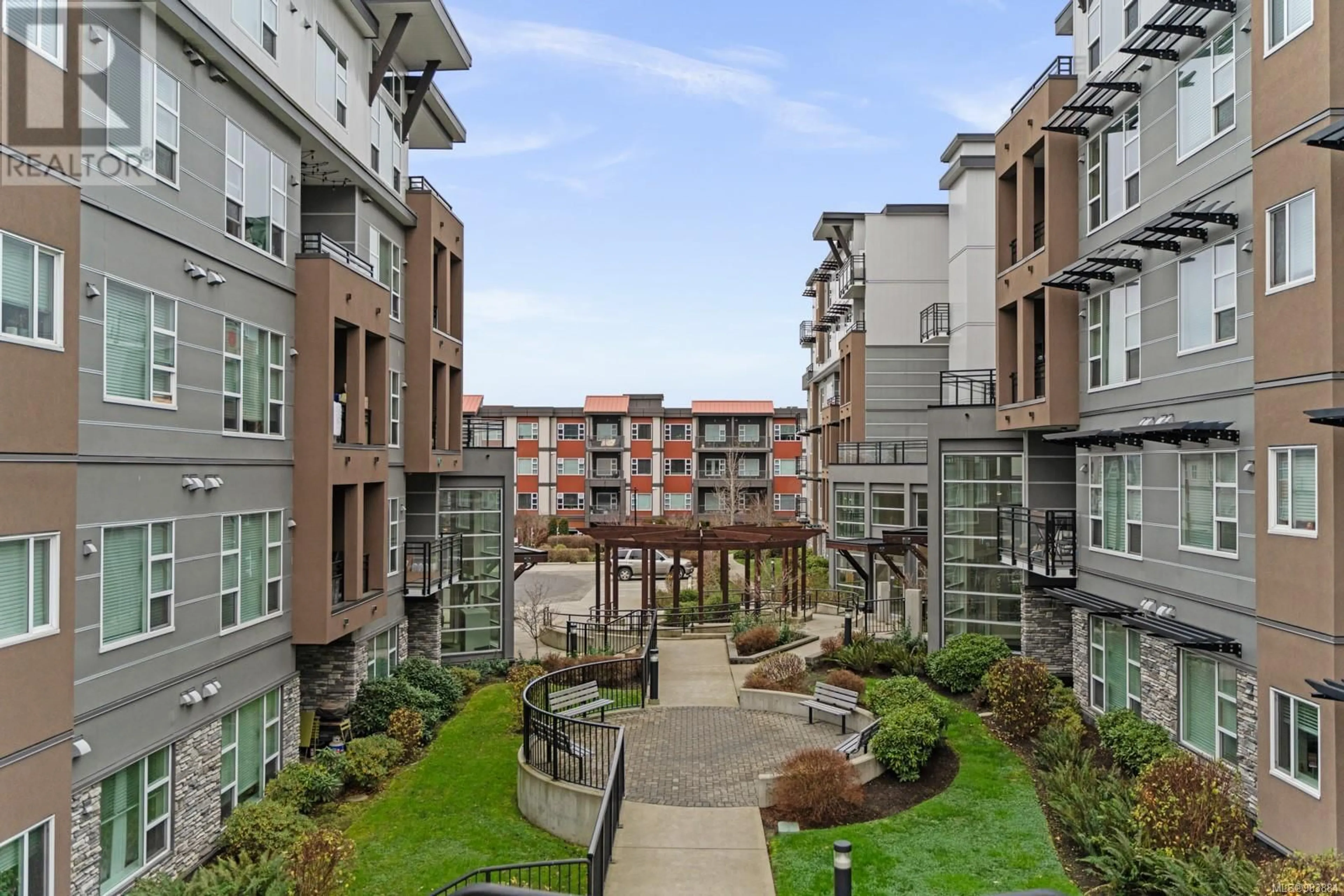 Patio, city buildings view from balcony for 405 1018 Inverness Rd, Saanich British Columbia V8X2S1