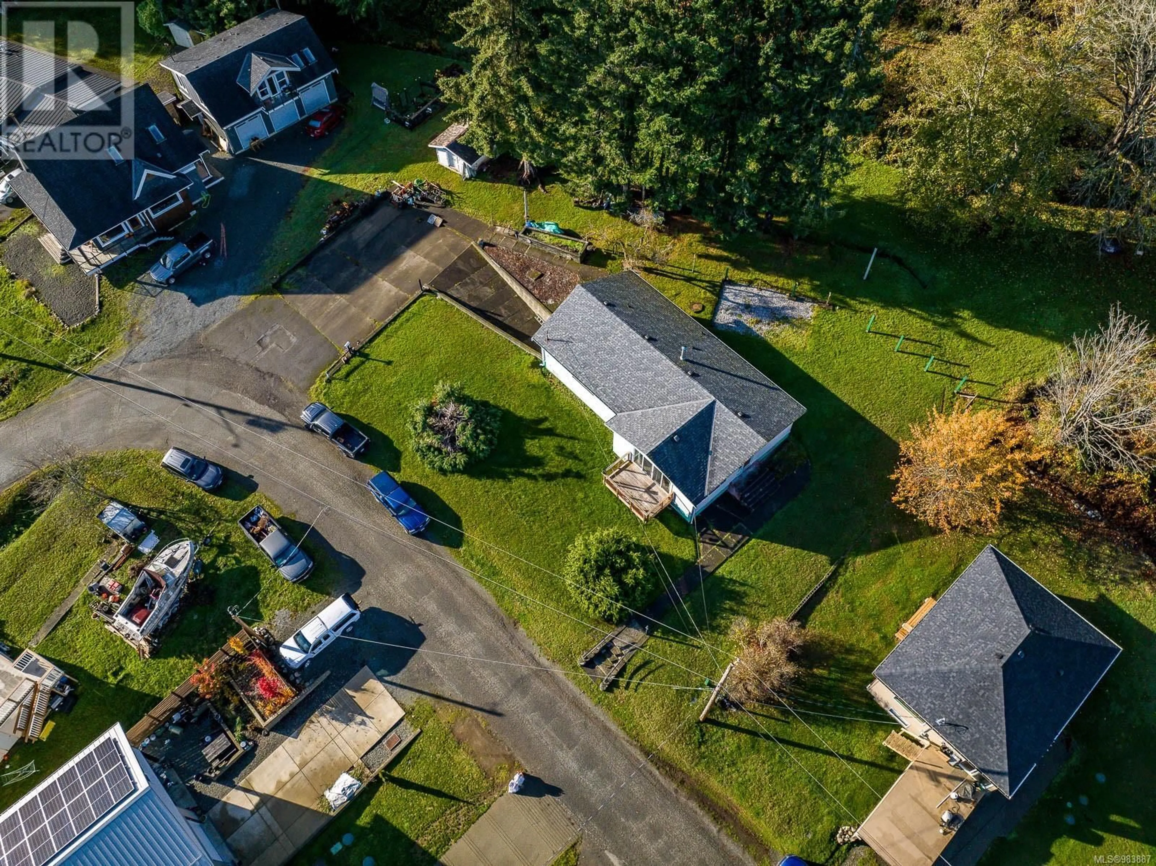 A pic from outside/outdoor area/front of a property/back of a property/a pic from drone, street for 5655 High St, Union Bay British Columbia V0R3B0