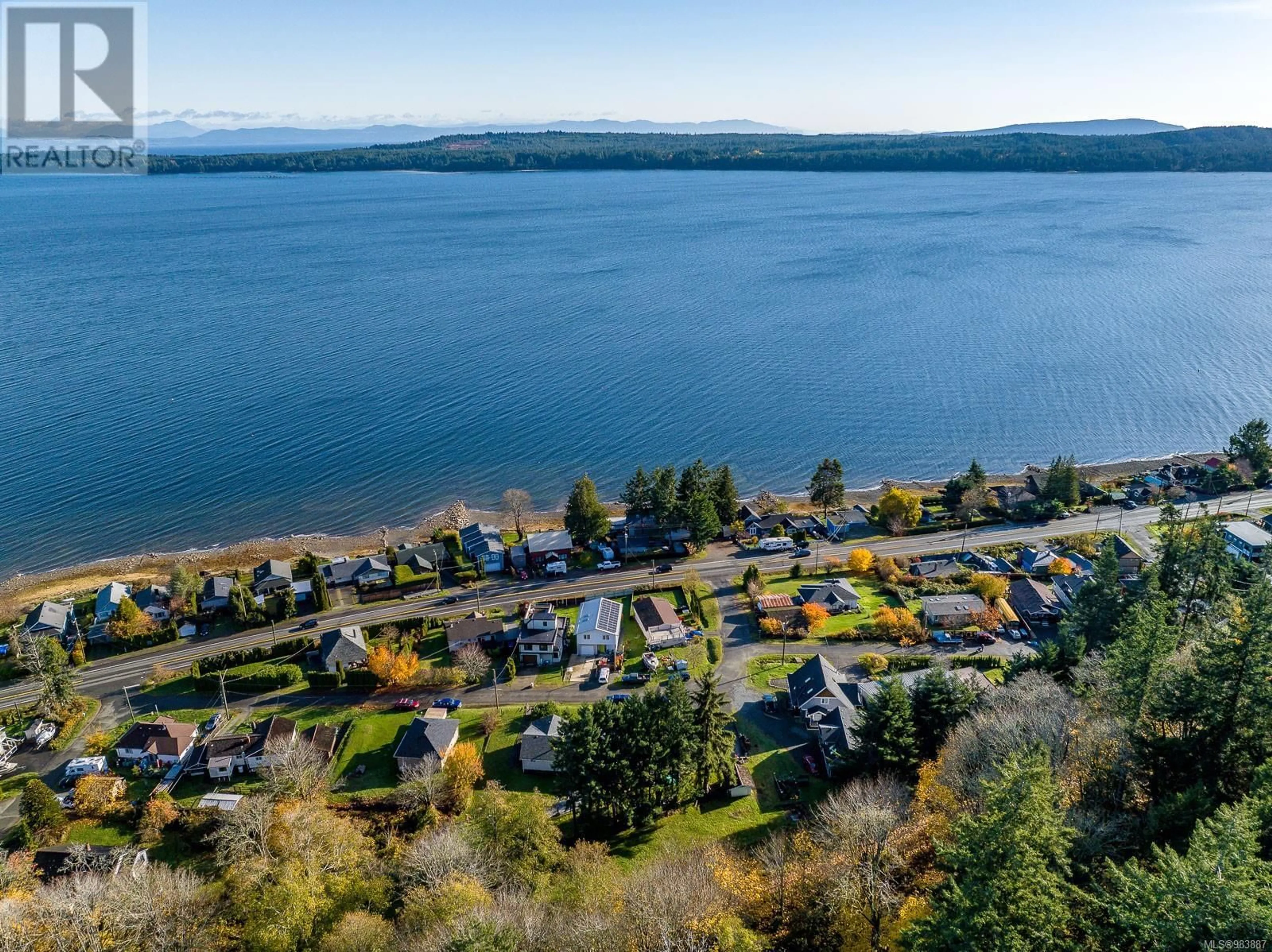 A pic from outside/outdoor area/front of a property/back of a property/a pic from drone, water/lake/river/ocean view for 5655 High St, Union Bay British Columbia V0R3B0