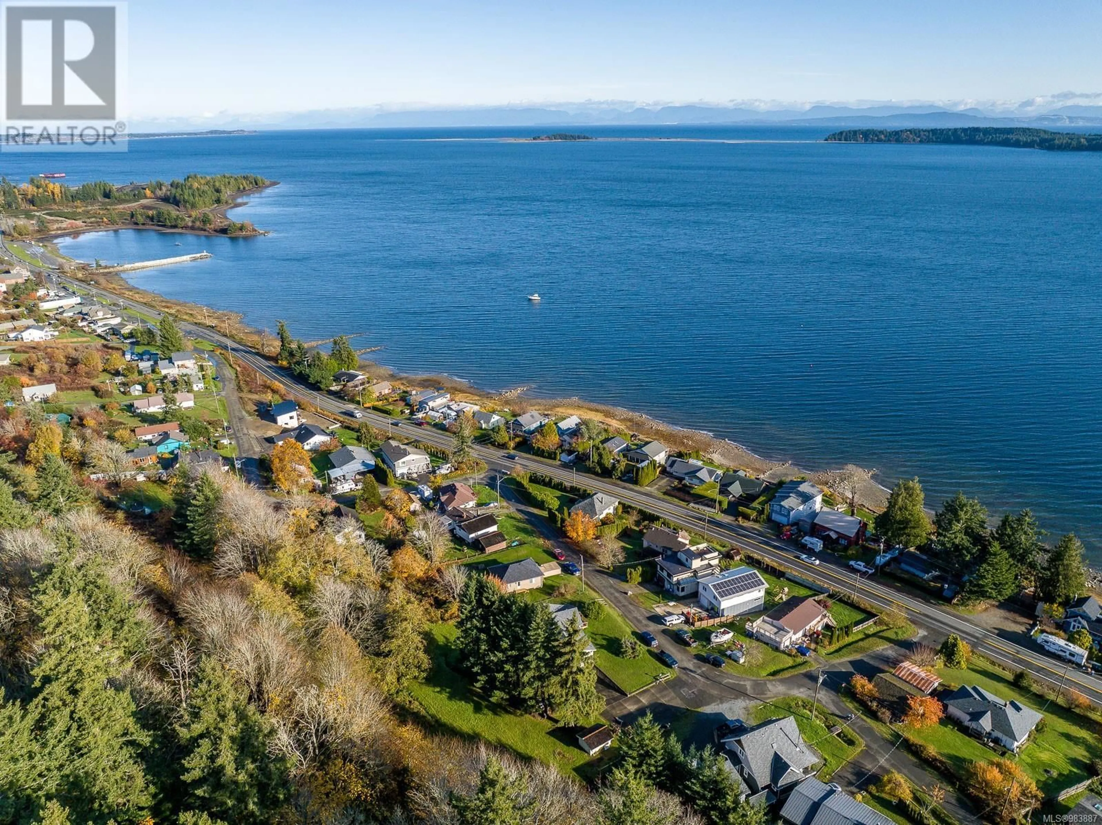 A pic from outside/outdoor area/front of a property/back of a property/a pic from drone, water/lake/river/ocean view for 5655 High St, Union Bay British Columbia V0R3B0