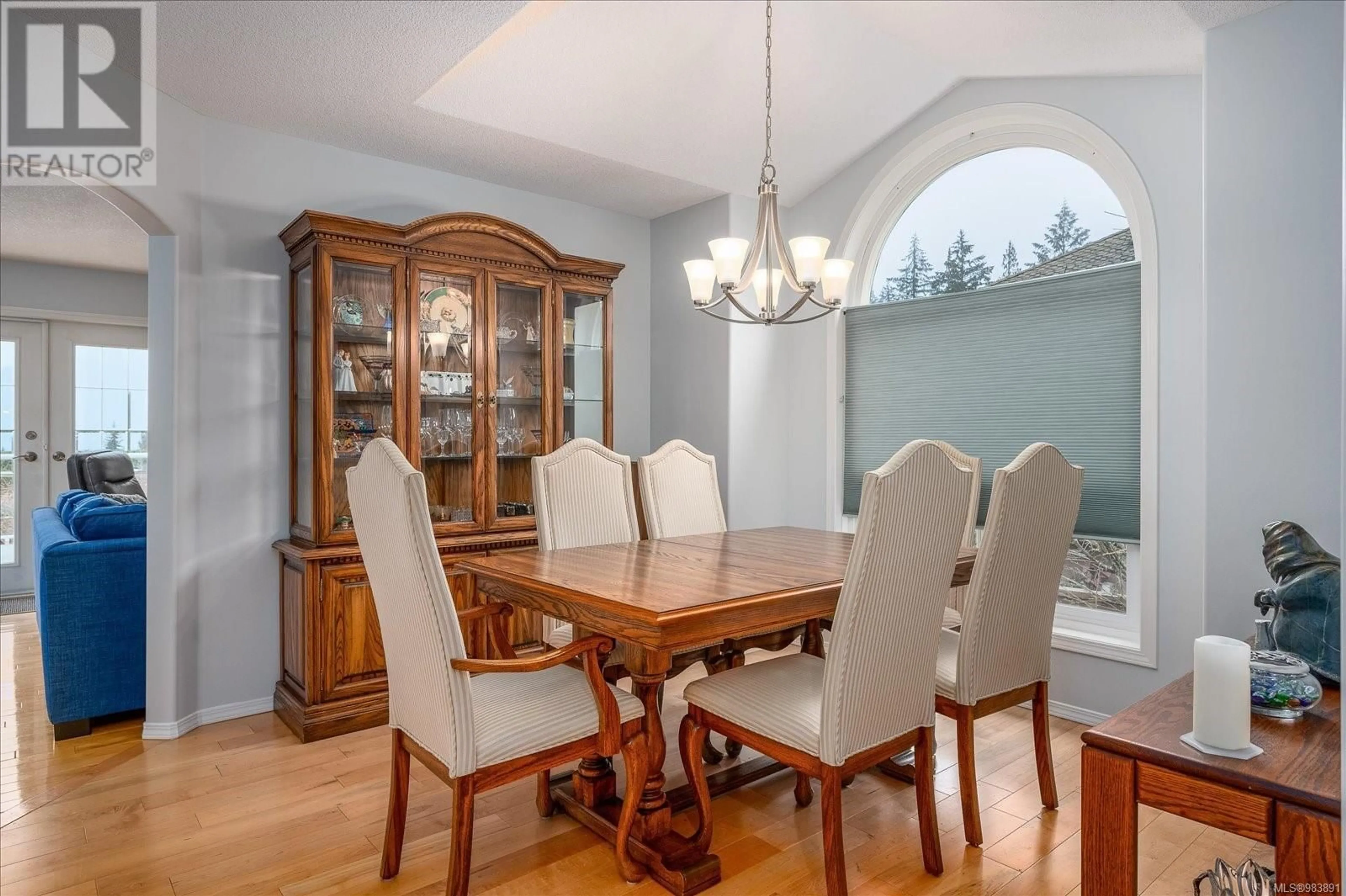 Dining room, wood/laminate floor for 5680 Lost Lake Rd, Nanaimo British Columbia V9T5H1