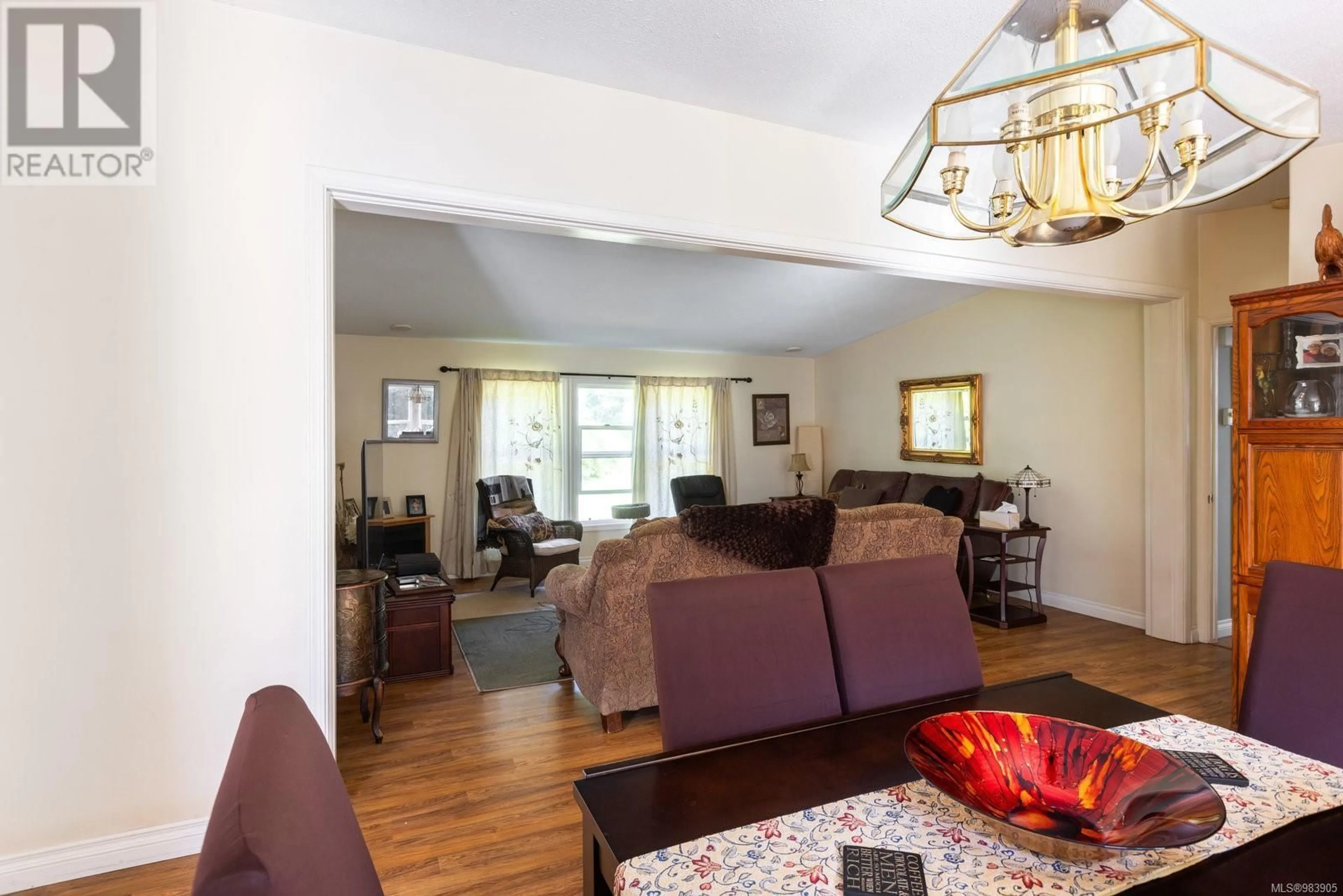Living room with furniture, wood/laminate floor for 7321 PACHEENA ROAD, Port Renfrew British Columbia V0S1K0