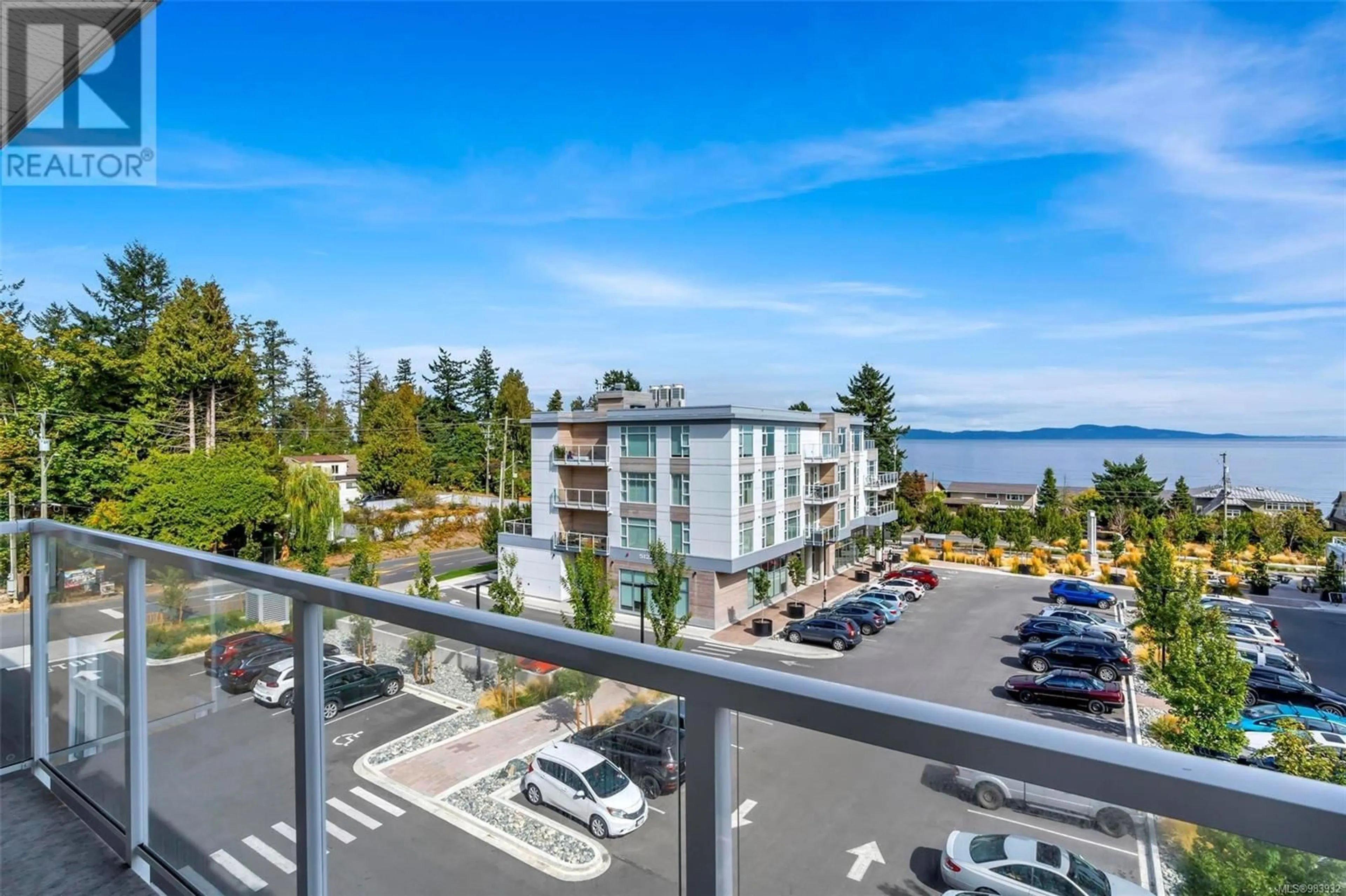 A pic from outside/outdoor area/front of a property/back of a property/a pic from drone, water/lake/river/ocean view for 306 5120 Cordova Bay Rd, Saanich British Columbia V8Y2K5