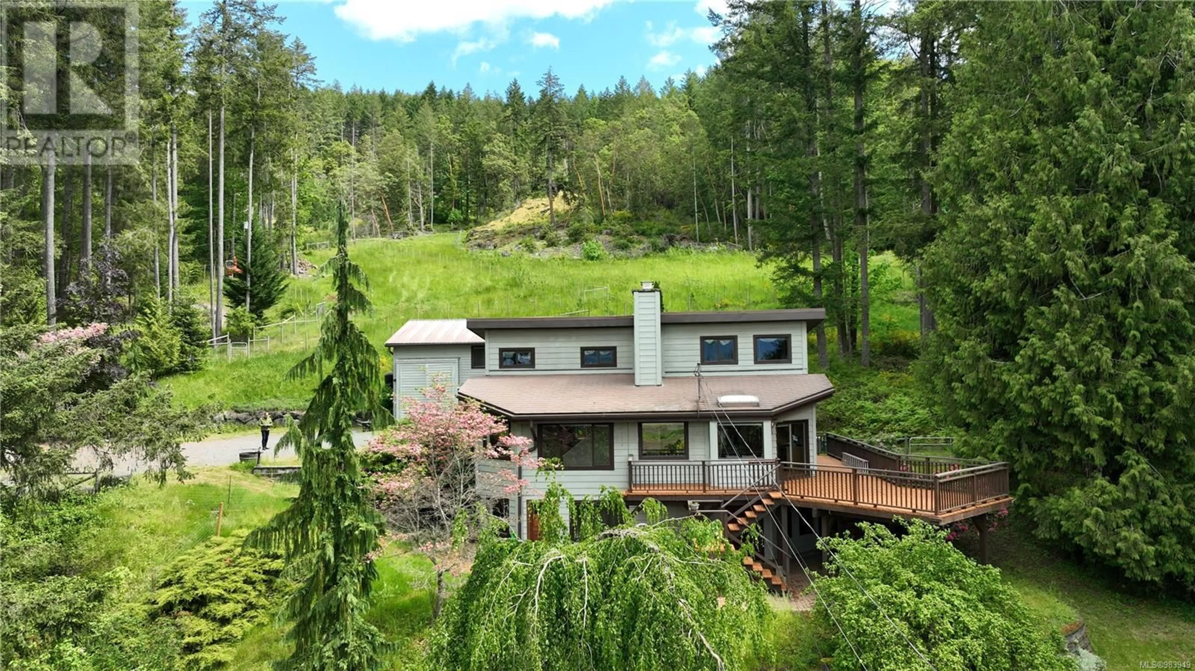 A pic from outside/outdoor area/front of a property/back of a property/a pic from drone, forest/trees view for 7701 Richards Trail, Duncan British Columbia V9L6B2