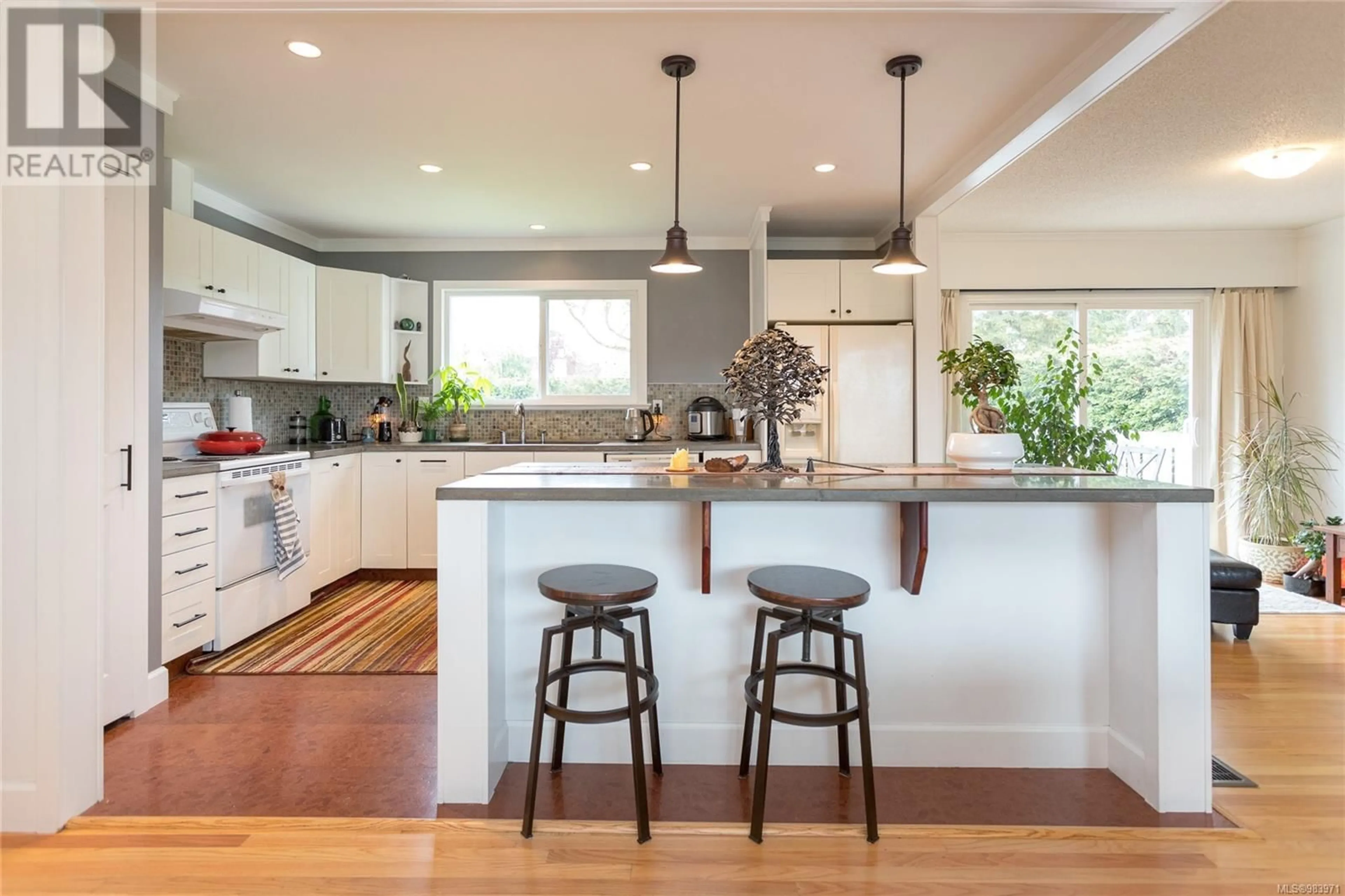 Contemporary kitchen, wood/laminate floor for 10319 Bowerbank Rd, Sidney British Columbia V8L3L2