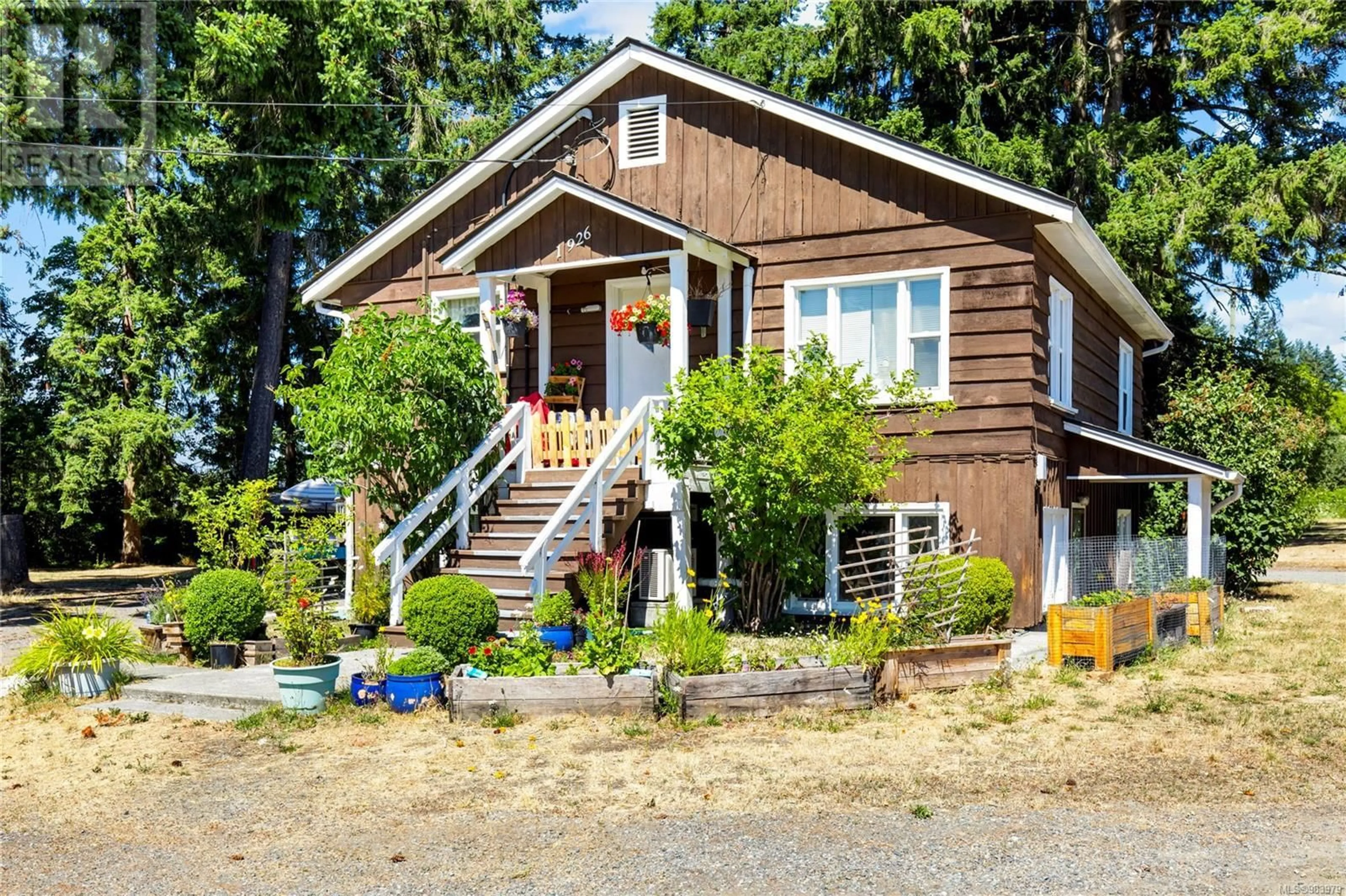 Home with vinyl exterior material, street for 1922 Cedar Rd, Nanaimo British Columbia V9X1L7