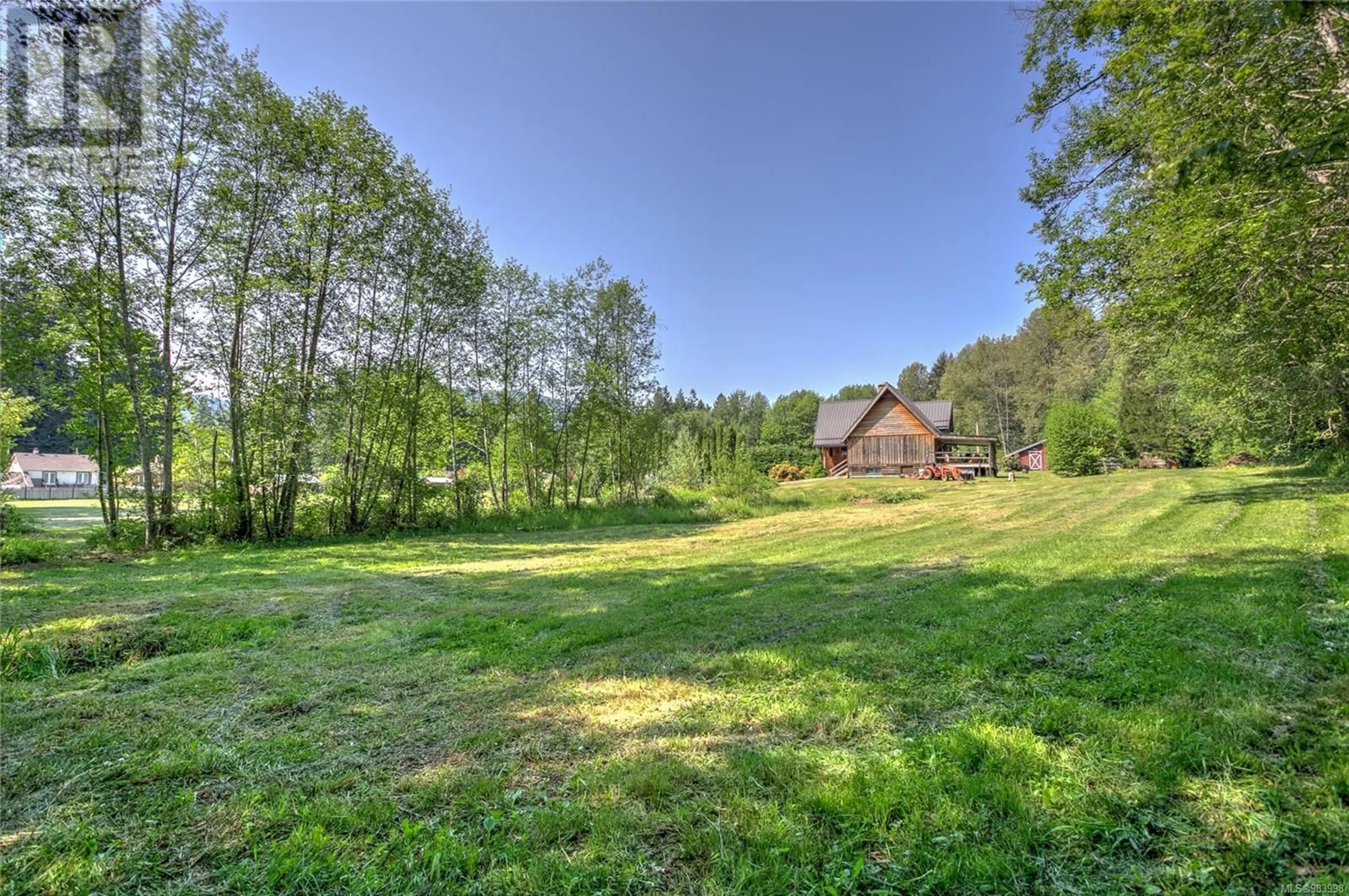 A pic from outside/outdoor area/front of a property/back of a property/a pic from drone, forest/trees view for 8035 Greendale Rd, Lake Cowichan British Columbia V0R2G0