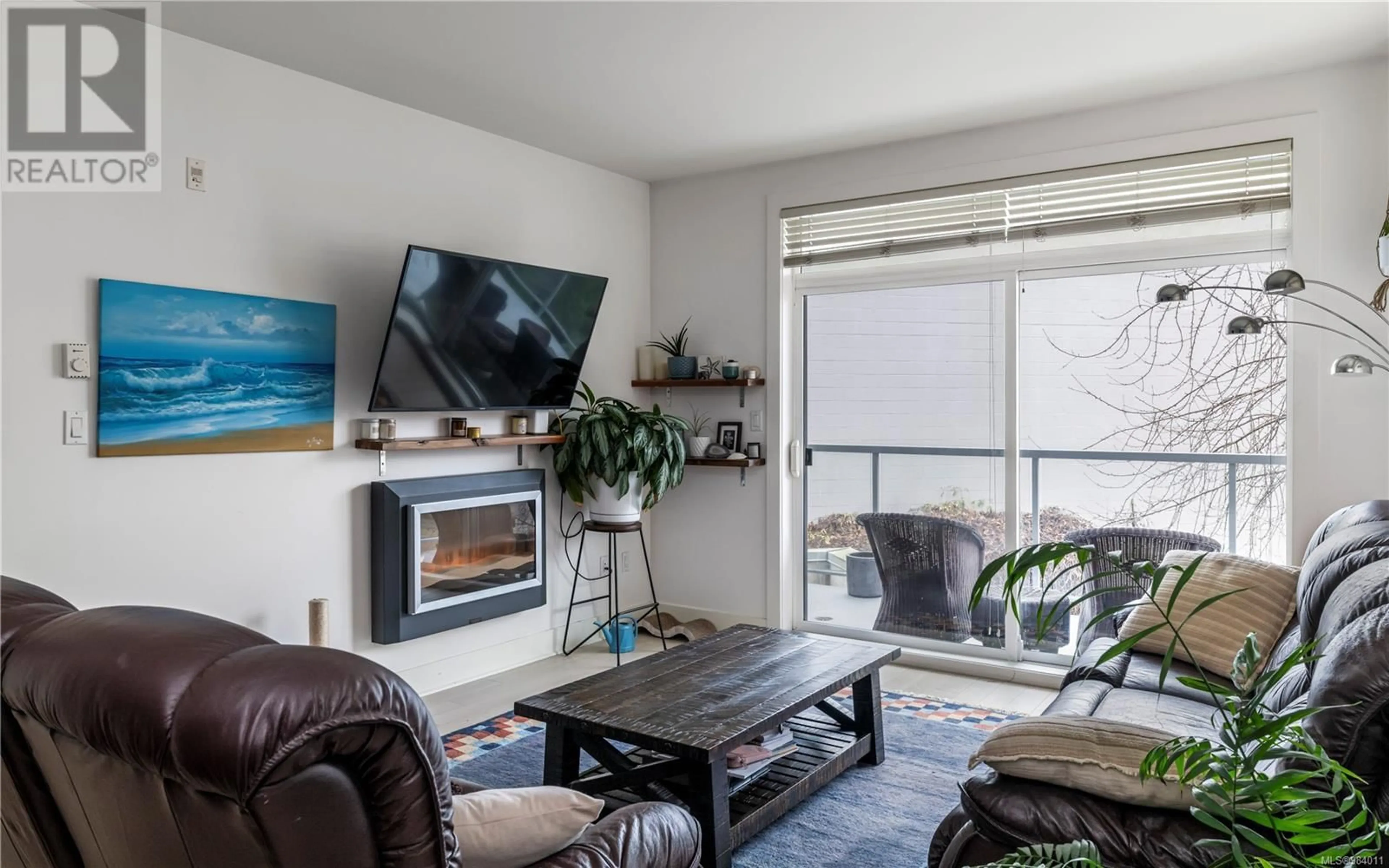 Living room with furniture, wood/laminate floor for 205 606 Speed Ave, Victoria British Columbia V8Z1A4