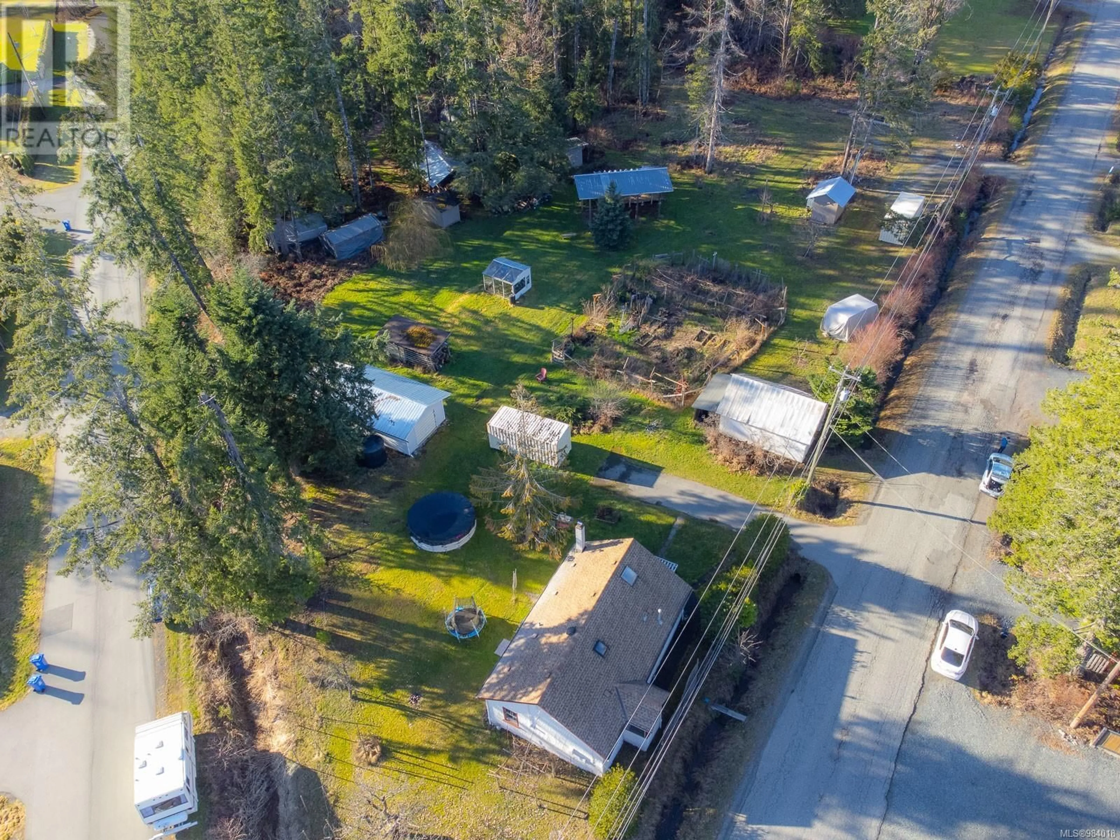 A pic from outside/outdoor area/front of a property/back of a property/a pic from drone, street for 5610 Chapman Rd, Port Alberni British Columbia V9Y8K3