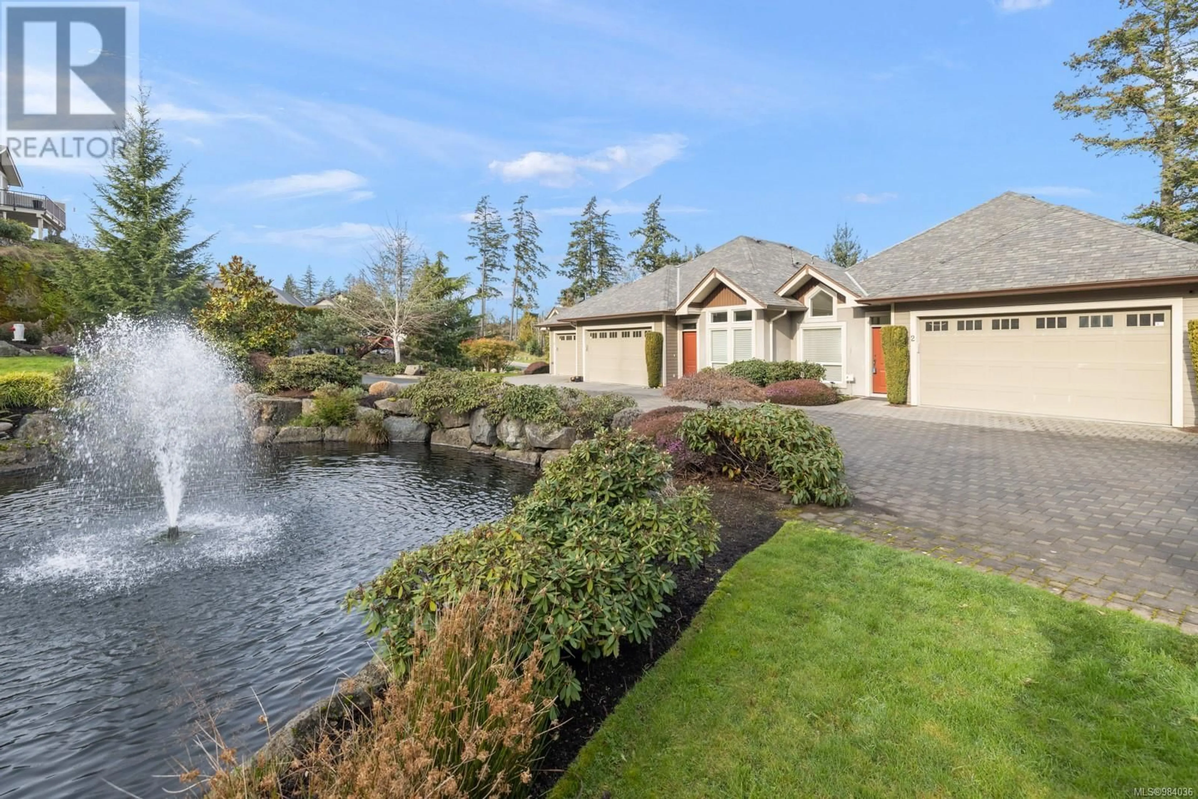 A pic from outside/outdoor area/front of a property/back of a property/a pic from drone, water/lake/river/ocean view for 2 551 Bezanton Way, Colwood British Columbia V9C0C5