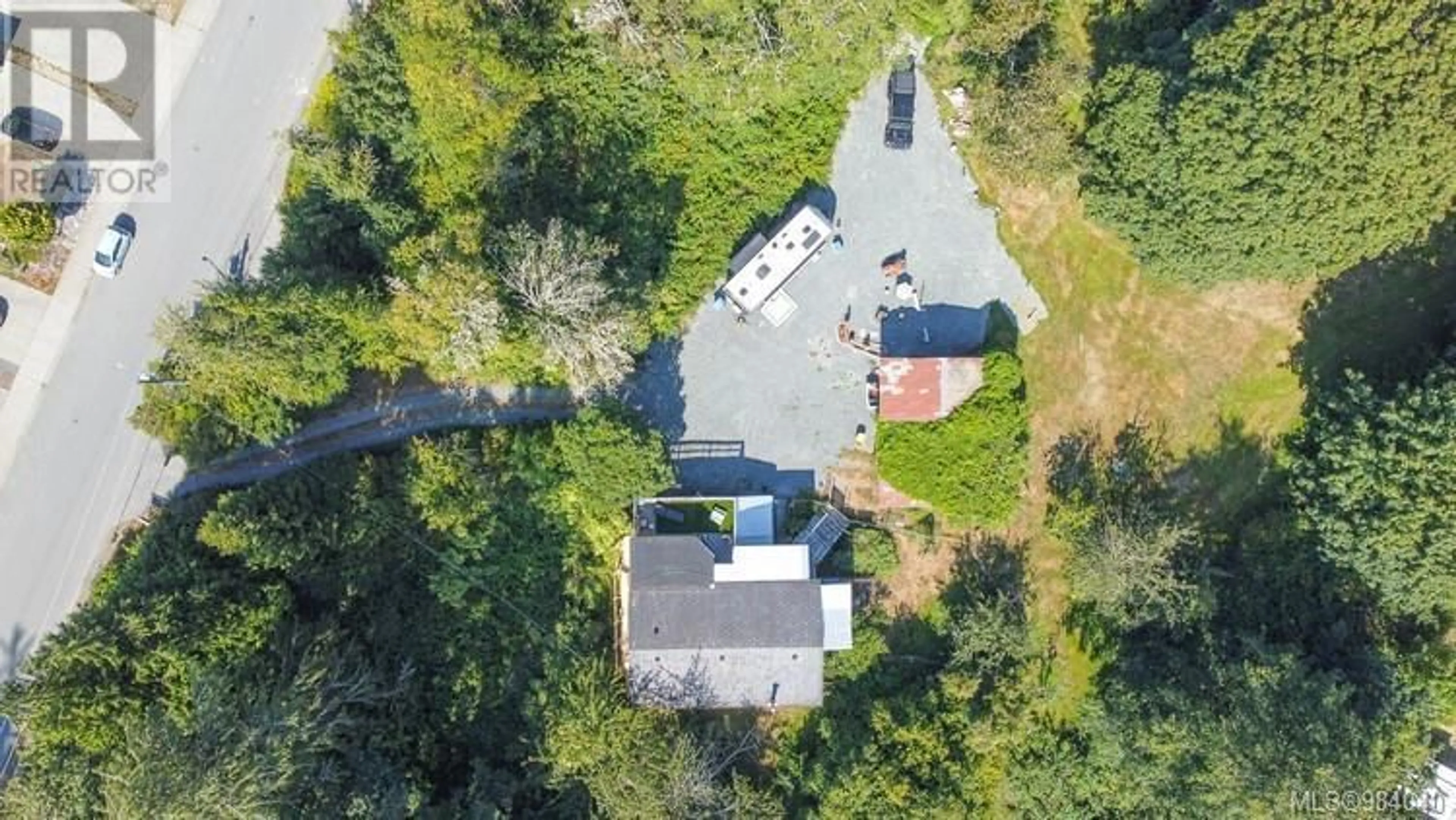 A pic from outside/outdoor area/front of a property/back of a property/a pic from drone, street for 7015 Wright Rd, Sooke British Columbia V9Z1M5