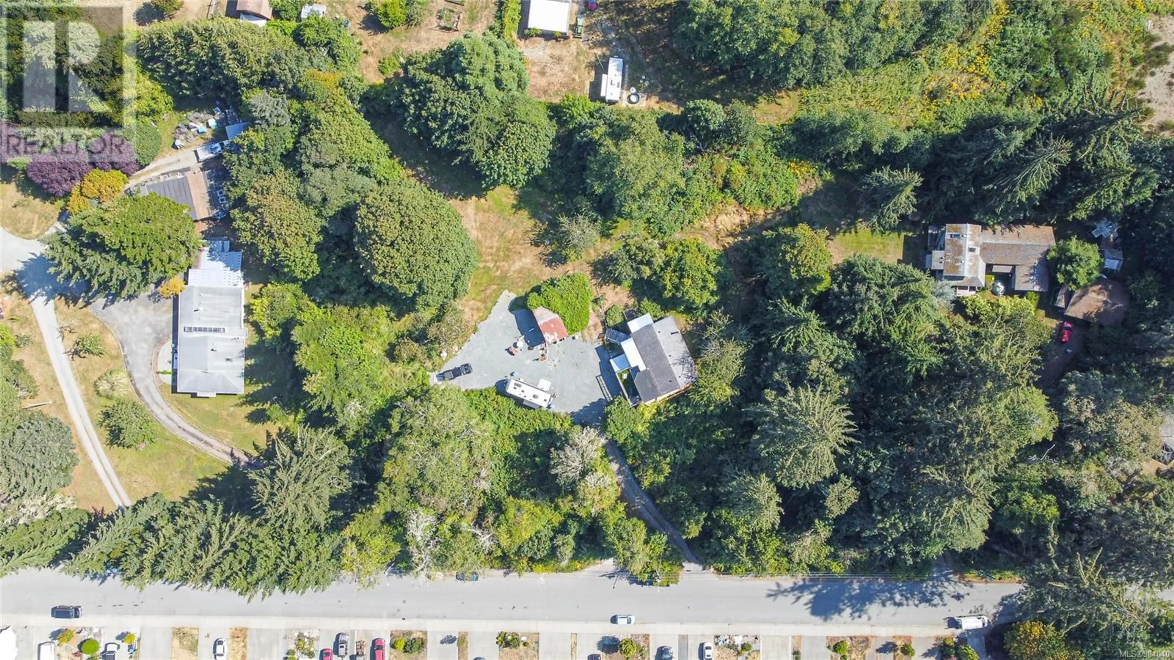 A pic from outside/outdoor area/front of a property/back of a property/a pic from drone, street for 7015 Wright Rd, Sooke British Columbia V9Z1M5