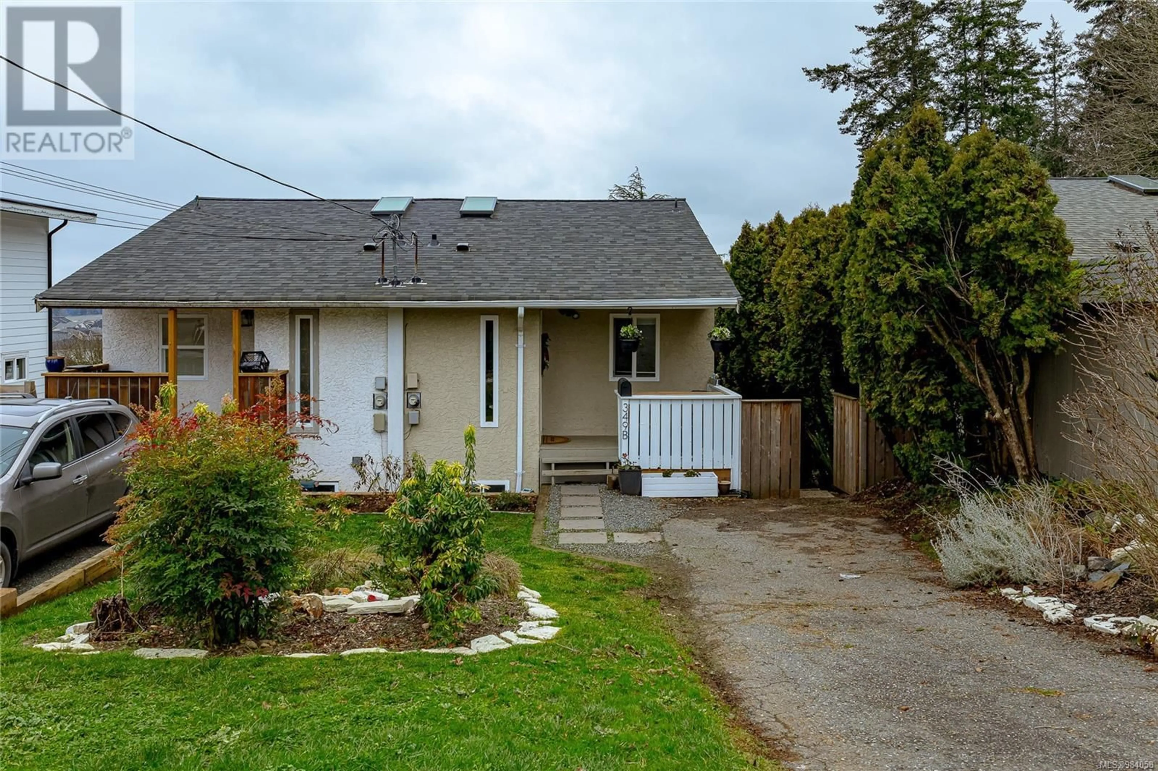 A pic from outside/outdoor area/front of a property/back of a property/a pic from drone, street for B 349 Cotlow Rd, Colwood British Columbia V9C2E9