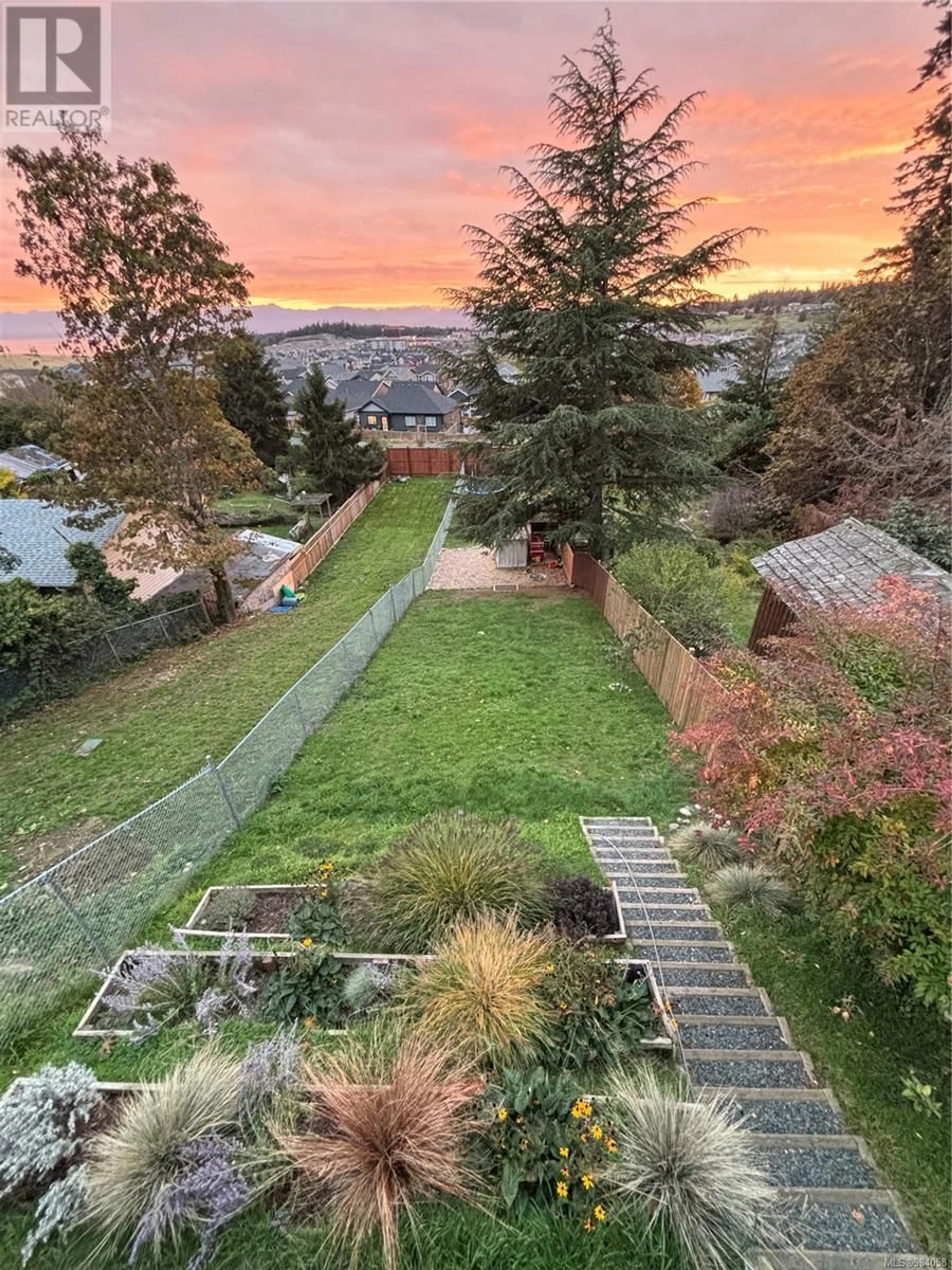 A pic from outside/outdoor area/front of a property/back of a property/a pic from drone, mountain view for B 349 Cotlow Rd, Colwood British Columbia V9C2E9