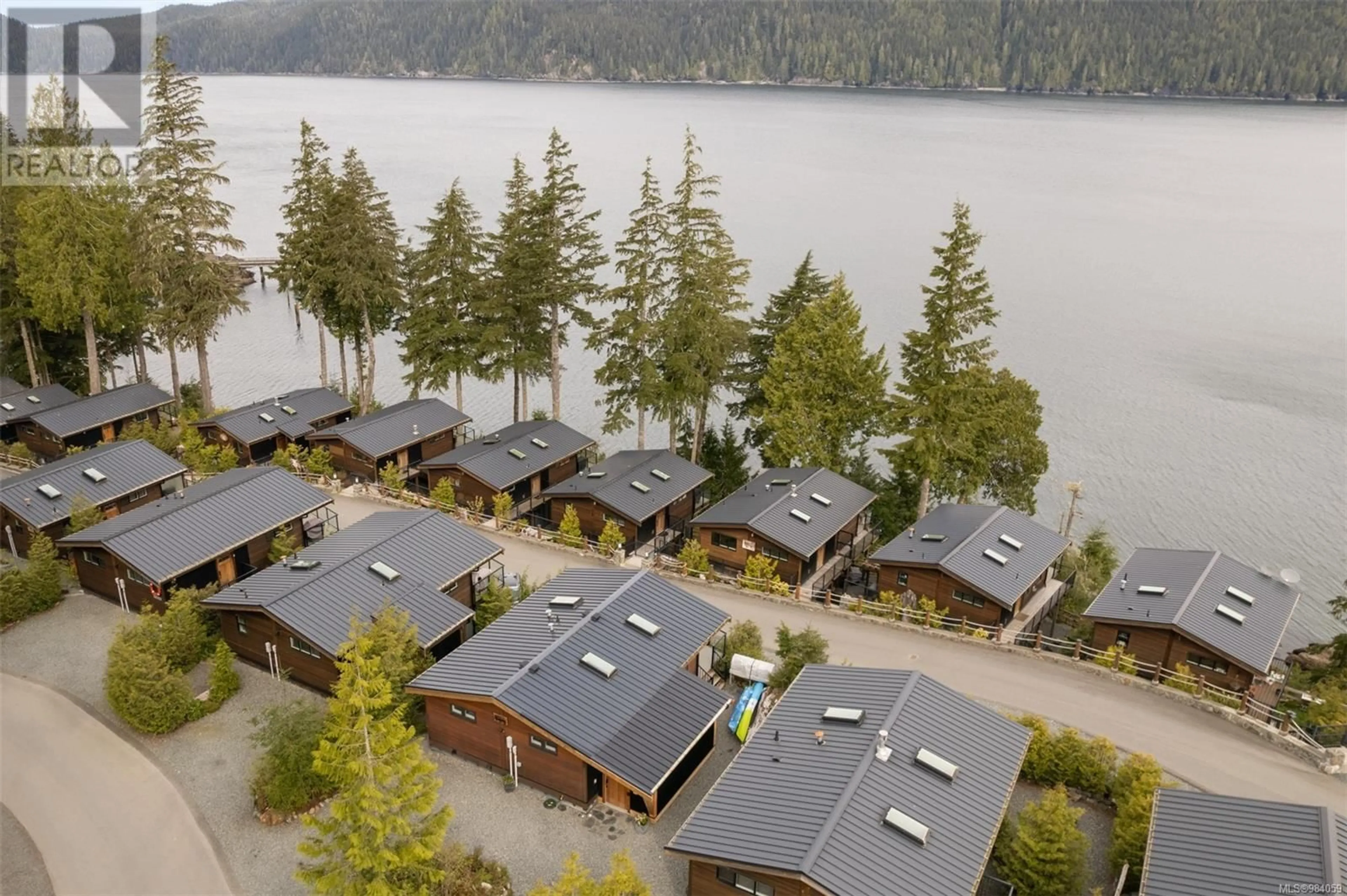 A pic from outside/outdoor area/front of a property/back of a property/a pic from drone, water/lake/river/ocean view for 245 6596 Baird Rd, Port Renfrew British Columbia V0S1K0