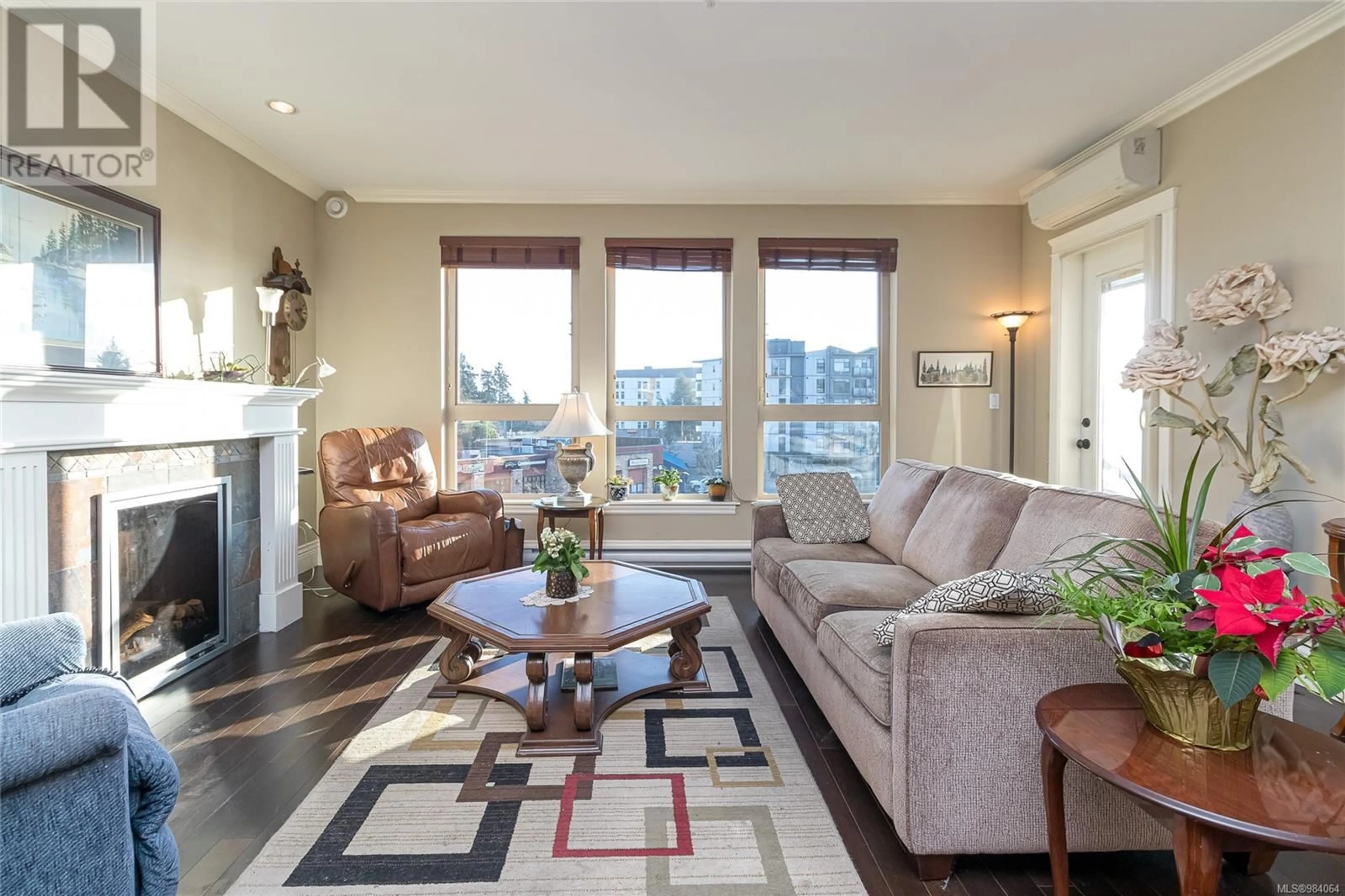 Living room with furniture, wood/laminate floor for 301 755 Goldstream Ave, Langford British Columbia V9B2X4