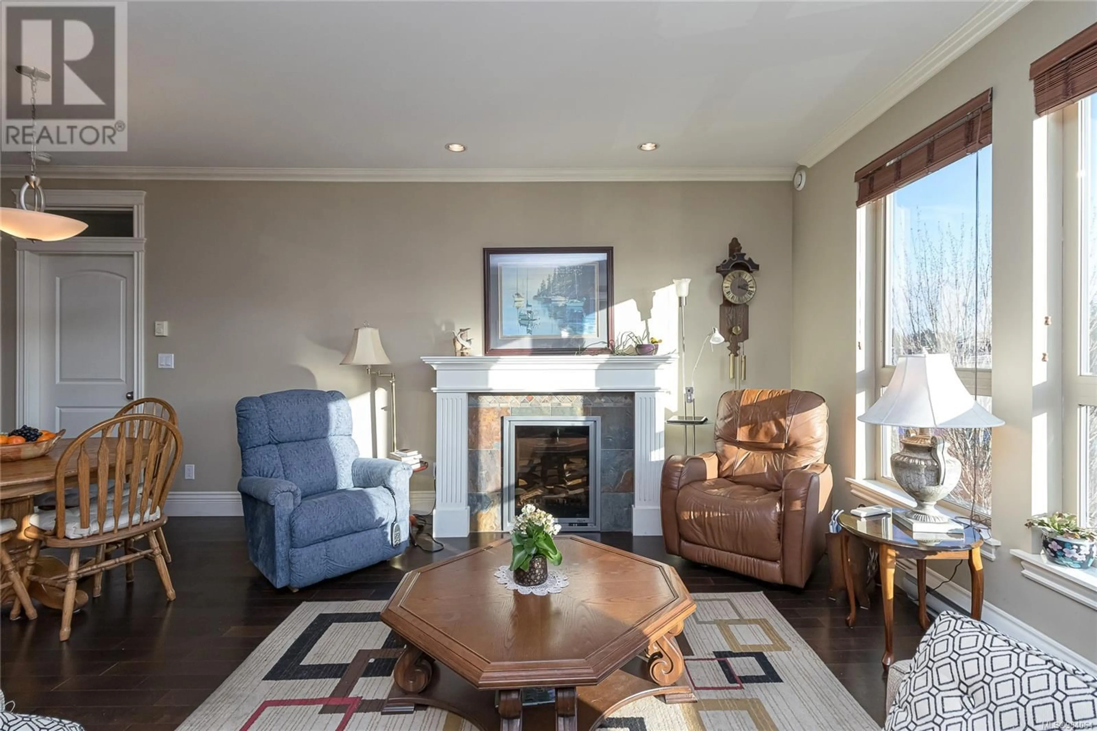 Living room with furniture, wood/laminate floor for 301 755 Goldstream Ave, Langford British Columbia V9B2X4