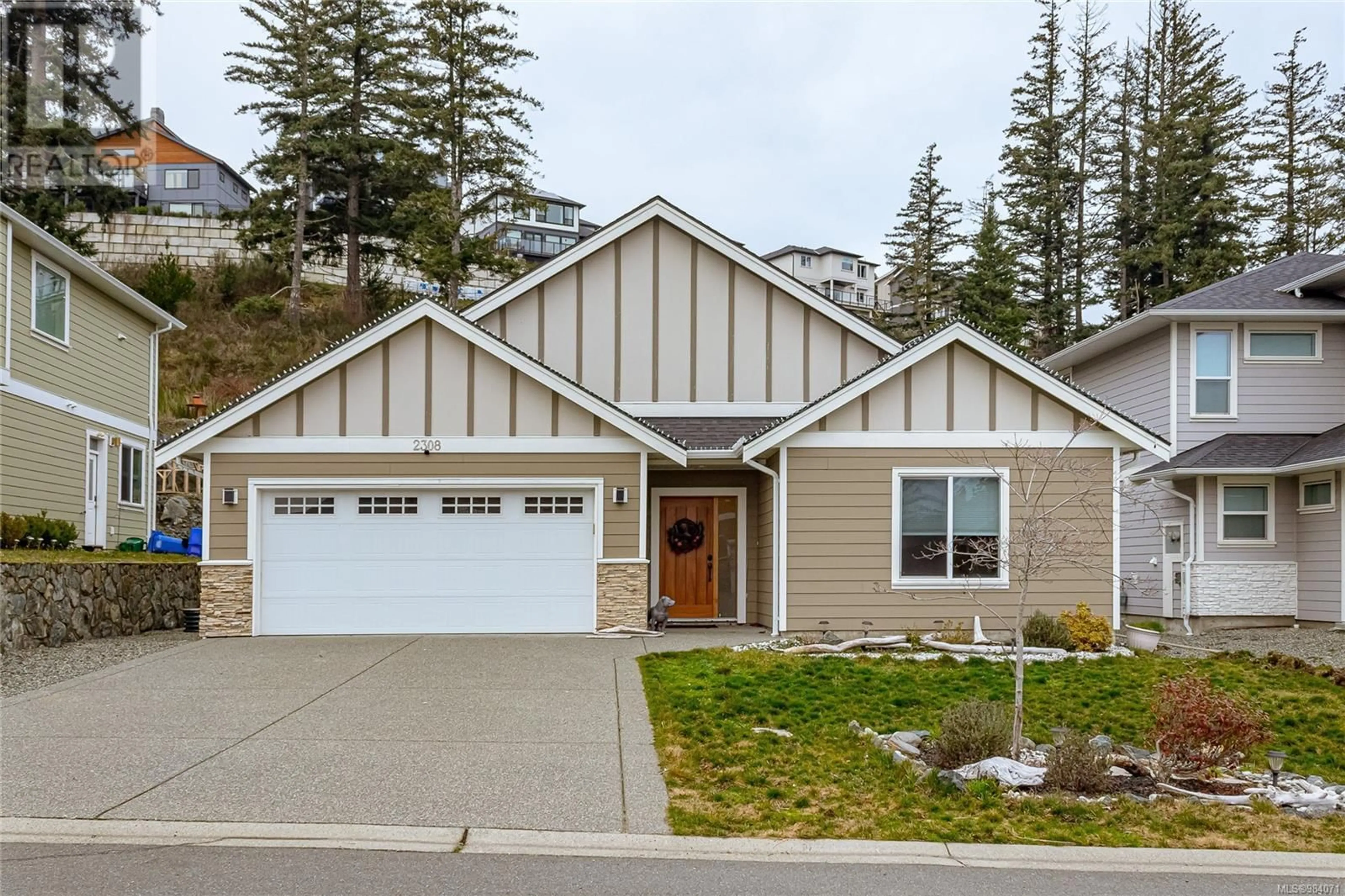 Home with vinyl exterior material, street for 2308 Mountain Heights Dr, Sooke British Columbia V9Z1M4