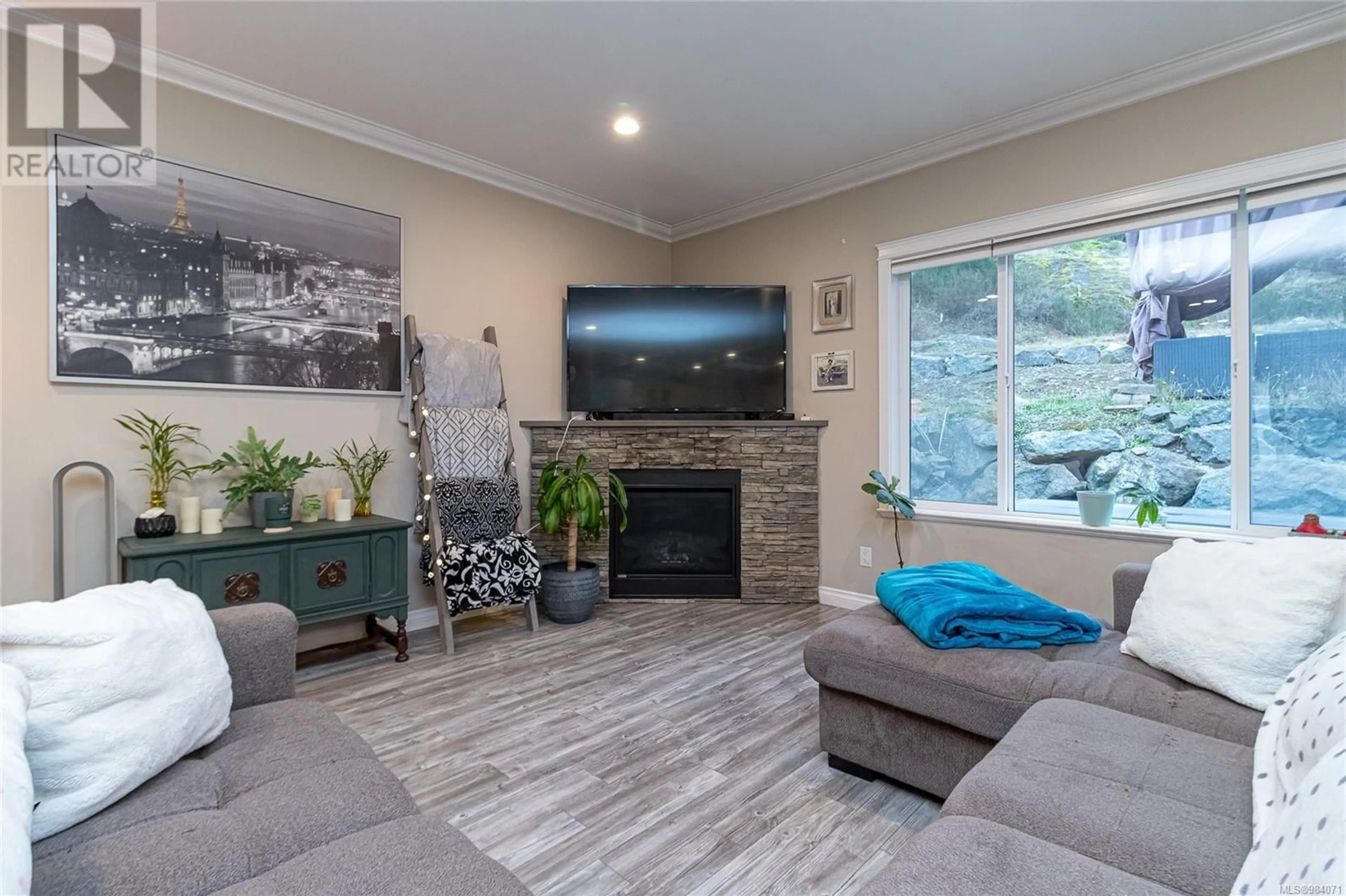 Living room with furniture, unknown for 2308 Mountain Heights Dr, Sooke British Columbia V9Z1M4