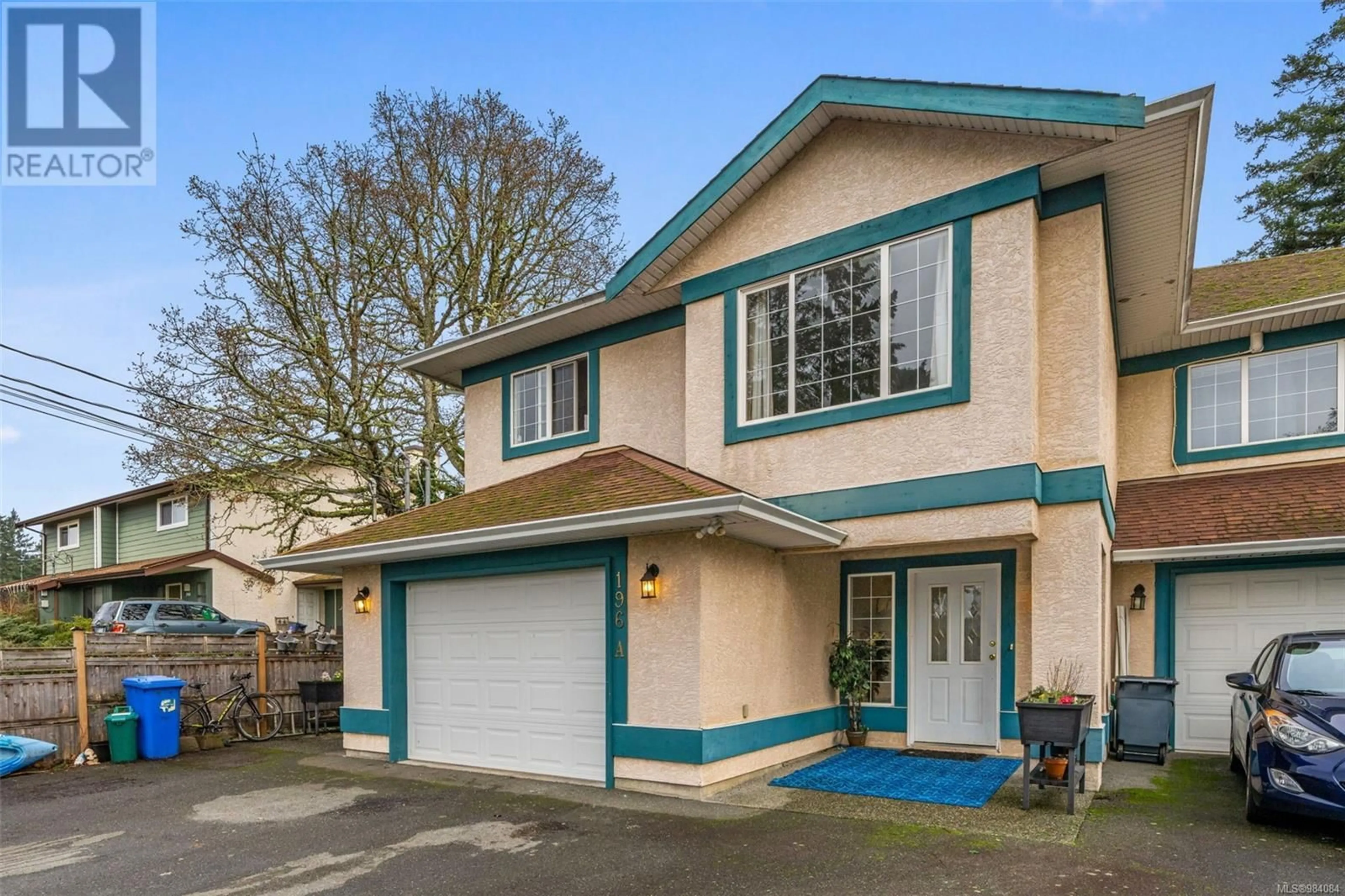 Home with vinyl exterior material, street for A 196 Belmont Rd, Colwood British Columbia V9C1B1