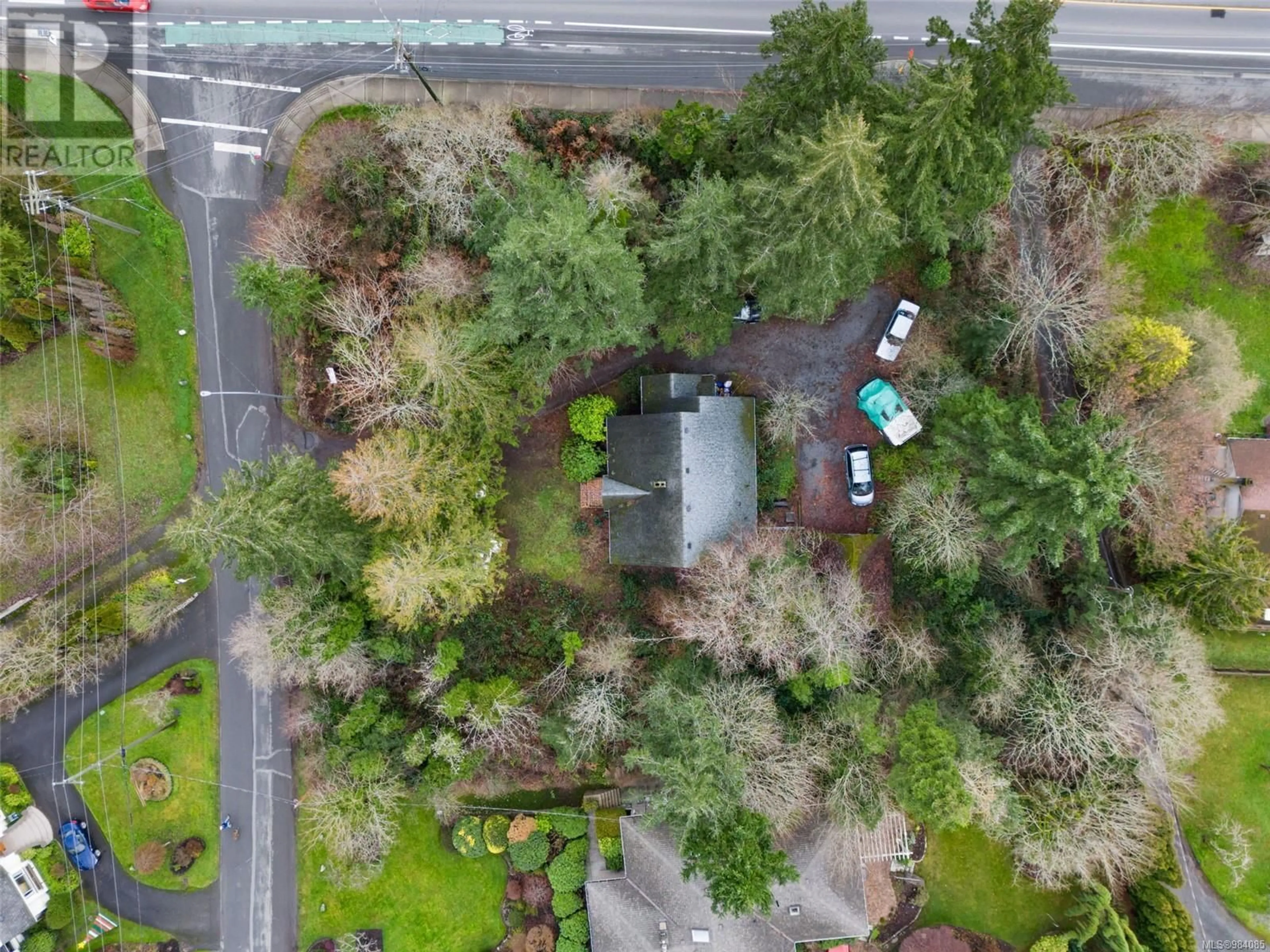 A pic from outside/outdoor area/front of a property/back of a property/a pic from drone, forest/trees view for 2895 Murray Dr, Saanich British Columbia V9A2S6