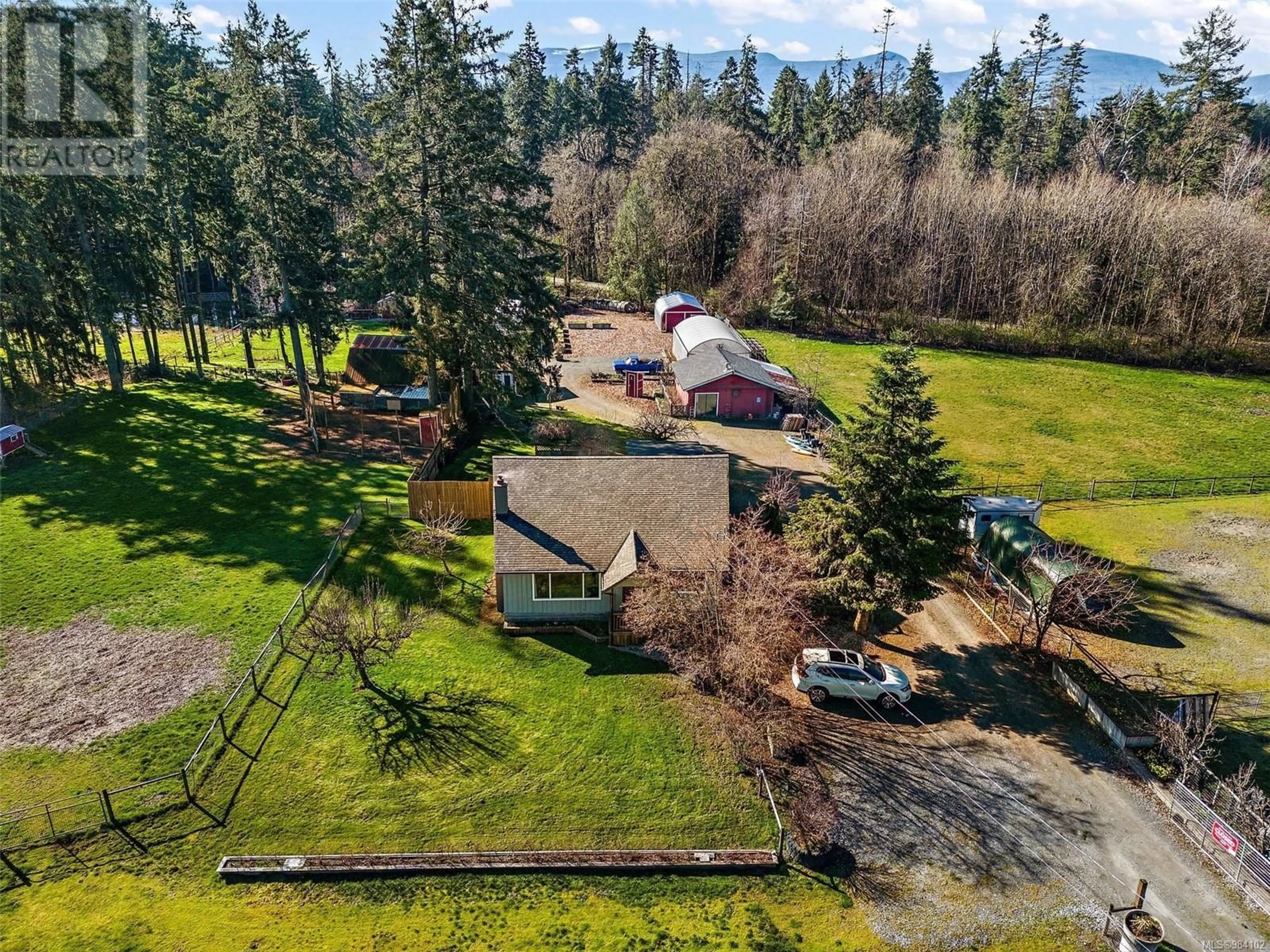 A pic from outside/outdoor area/front of a property/back of a property/a pic from drone, unknown for 3574 Cowichan Lake Rd, Duncan British Columbia V9L6K5