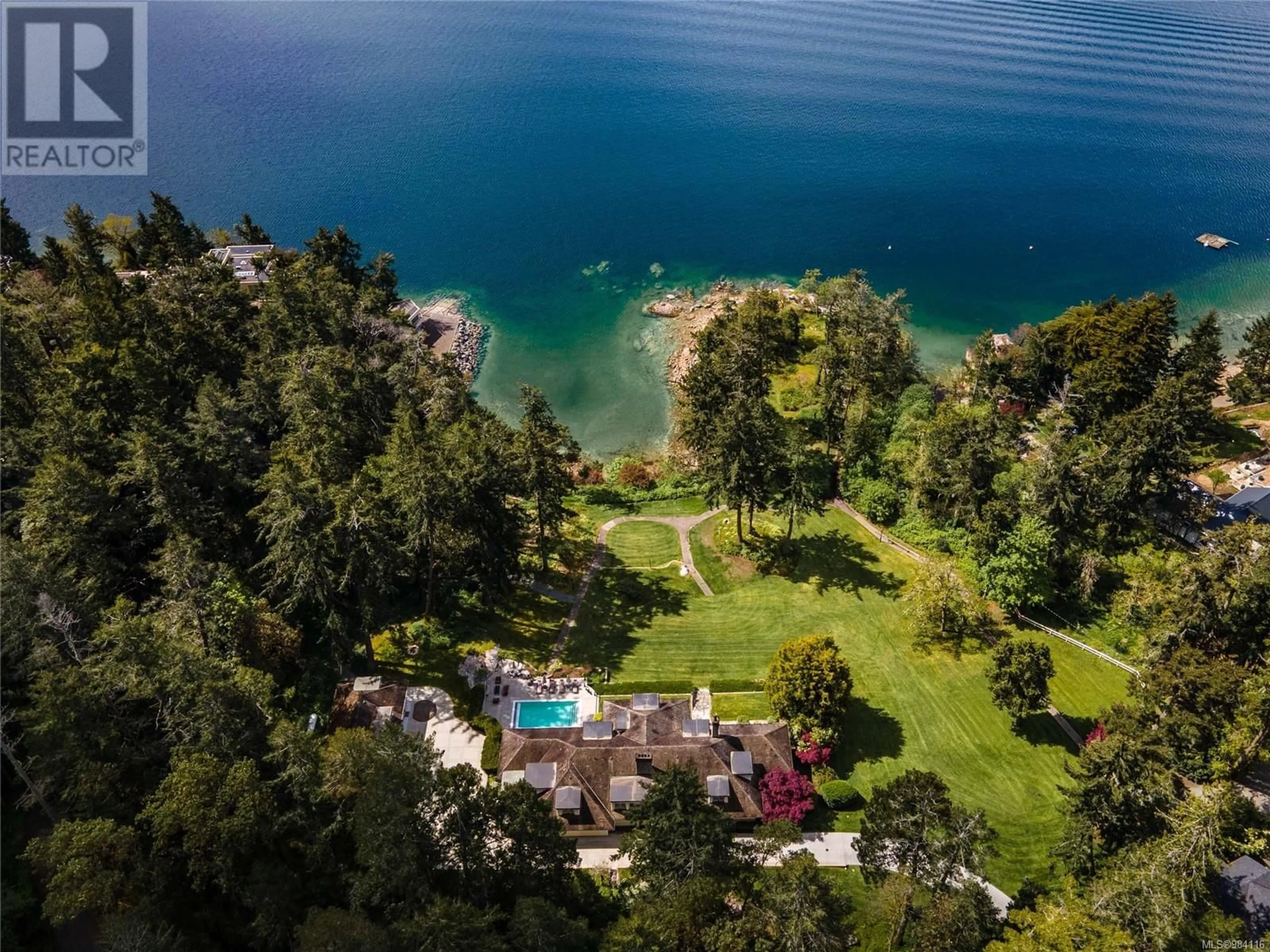 A pic from outside/outdoor area/front of a property/back of a property/a pic from drone, water/lake/river/ocean view for 605 Senanus Dr, Central Saanich British Columbia V8M1S6