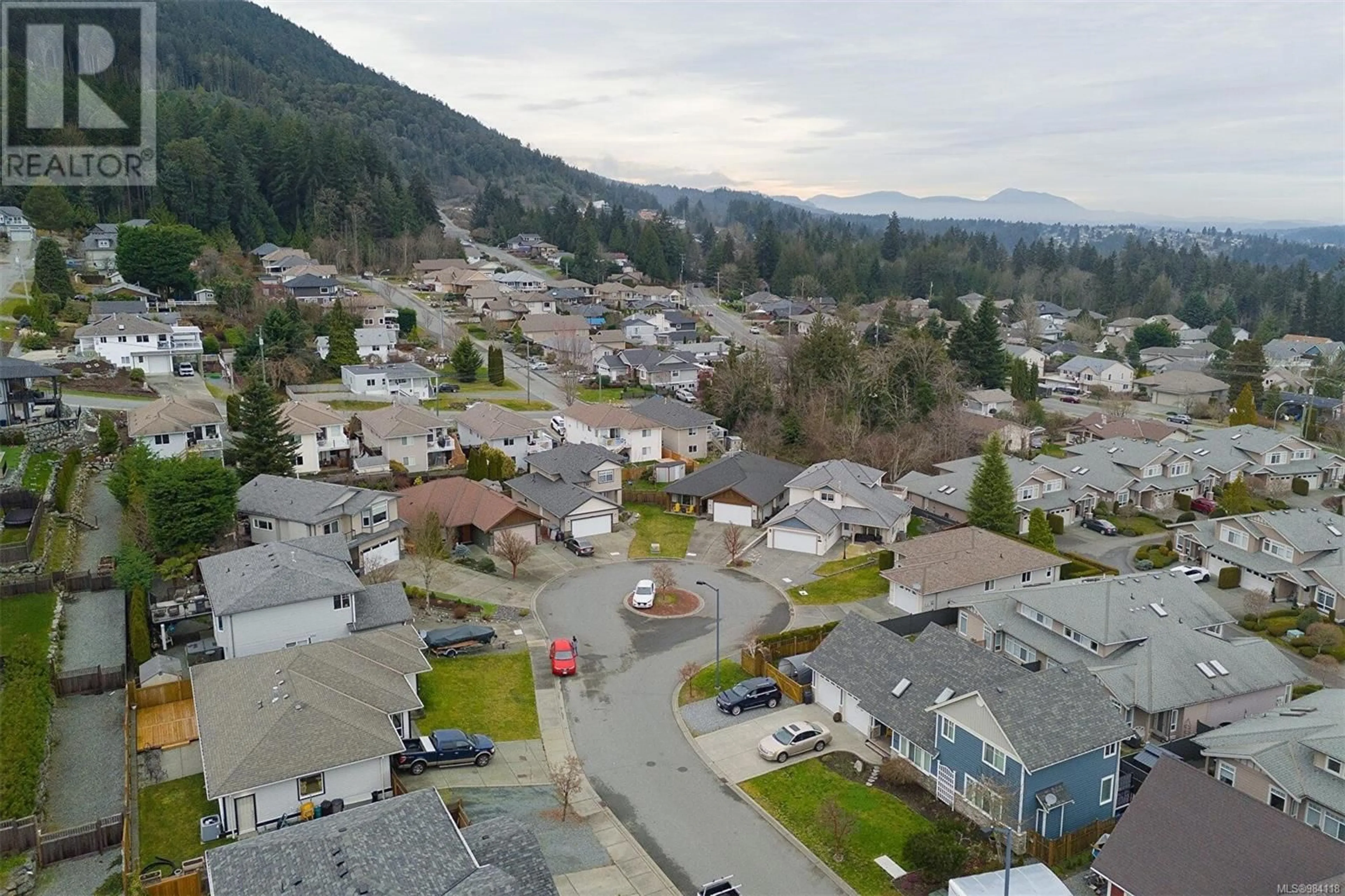 A pic from outside/outdoor area/front of a property/back of a property/a pic from drone, mountain view for 521 Ballou Pl, Ladysmith British Columbia V9G2C7