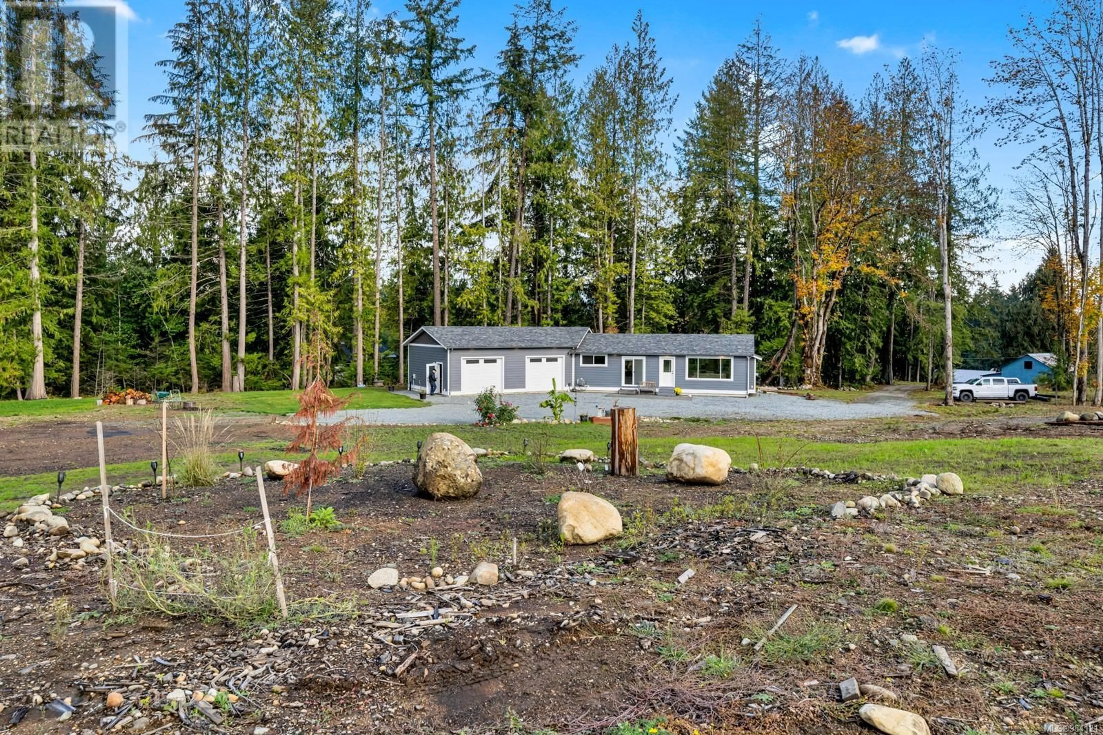 A pic from outside/outdoor area/front of a property/back of a property/a pic from drone, unknown for 5056 White Rd, Duncan British Columbia V9L6H5