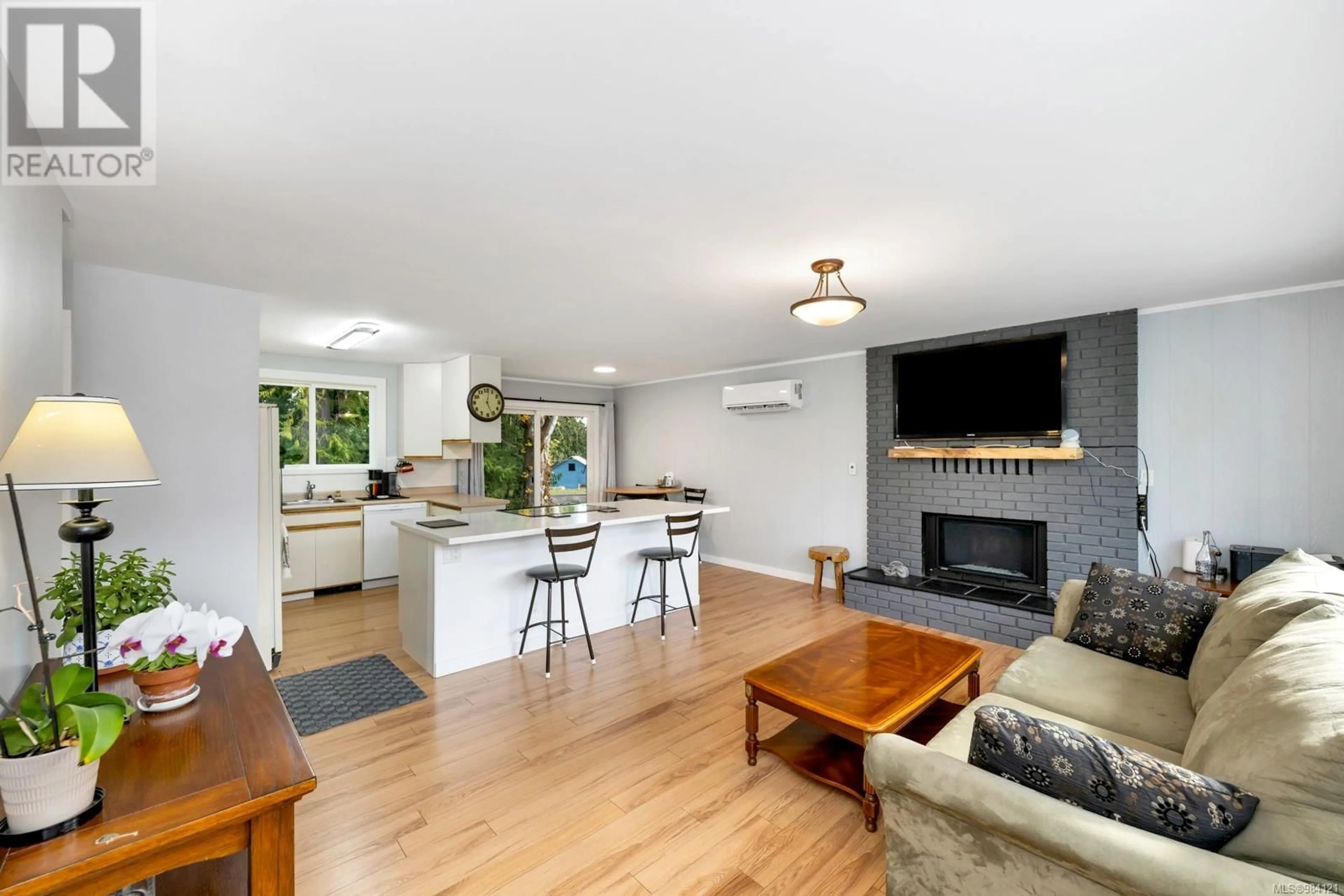 Open concept kitchen, wood/laminate floor for 5056 White Rd, Duncan British Columbia V9L6H5